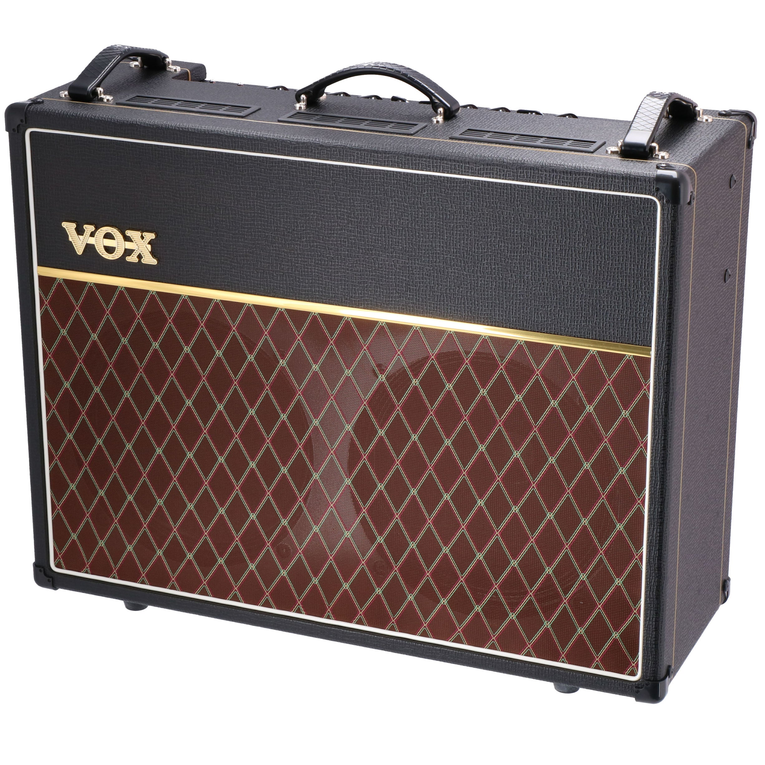 Black Vox guitar amplifier with diamond-patterned grill and gold logo.
