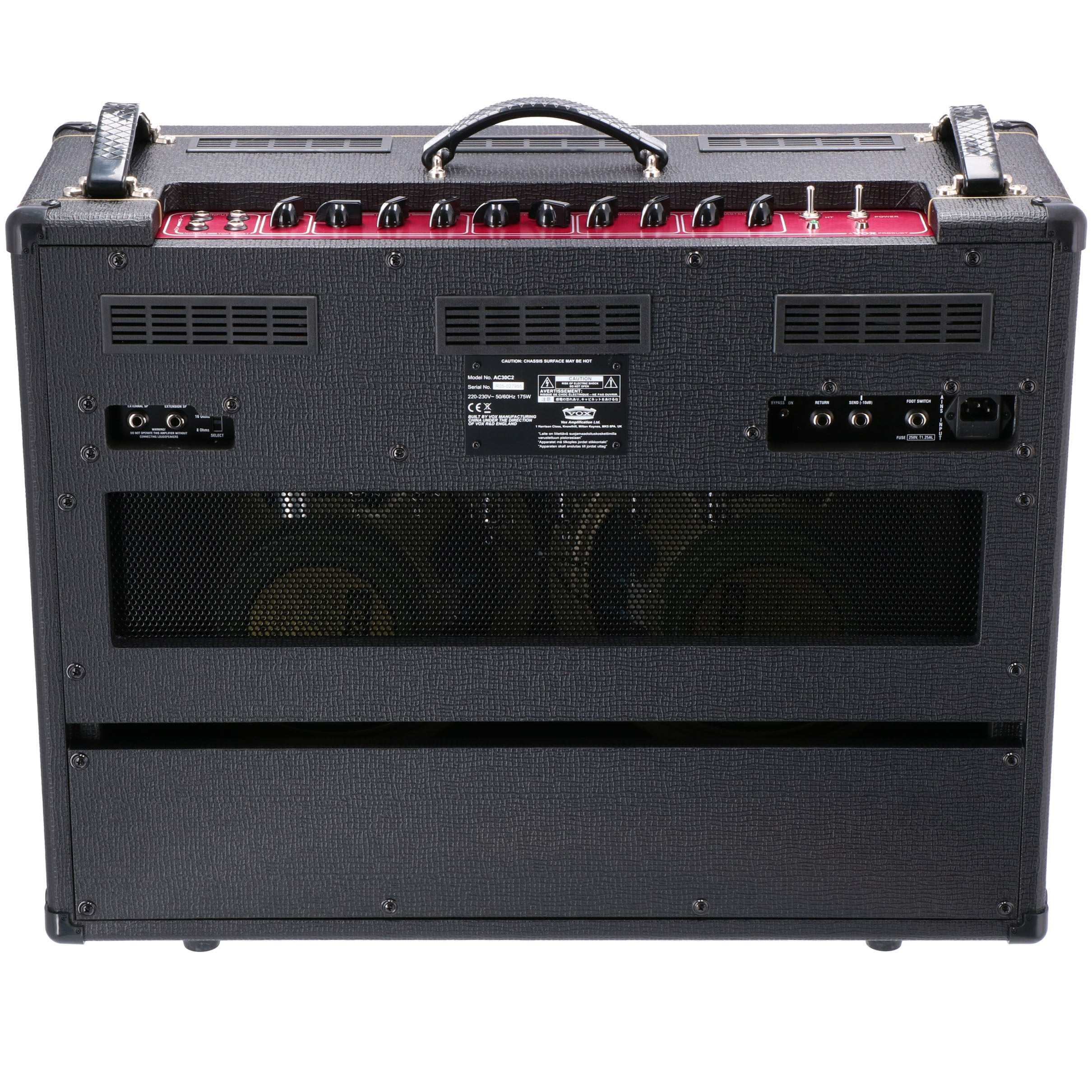 Black amplifier with red knobs, handle, vents, and ports. Rear view.