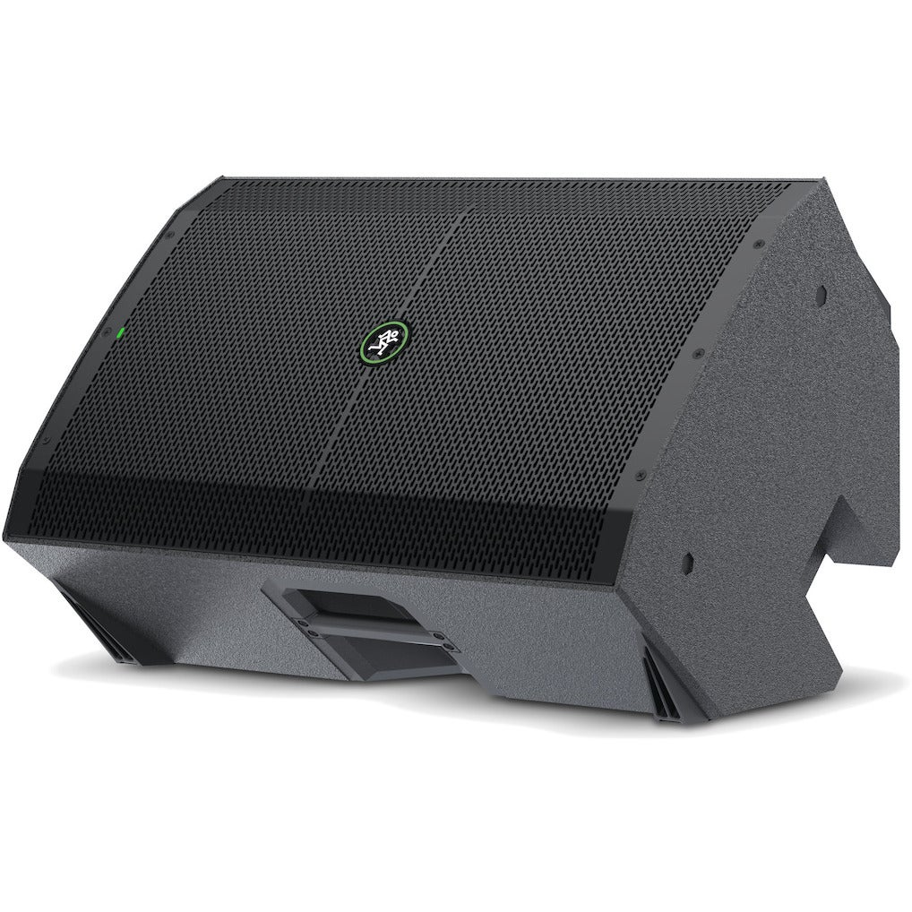 Zwarte podium monitor luidspreker met Mackie logo en groen lampje.
