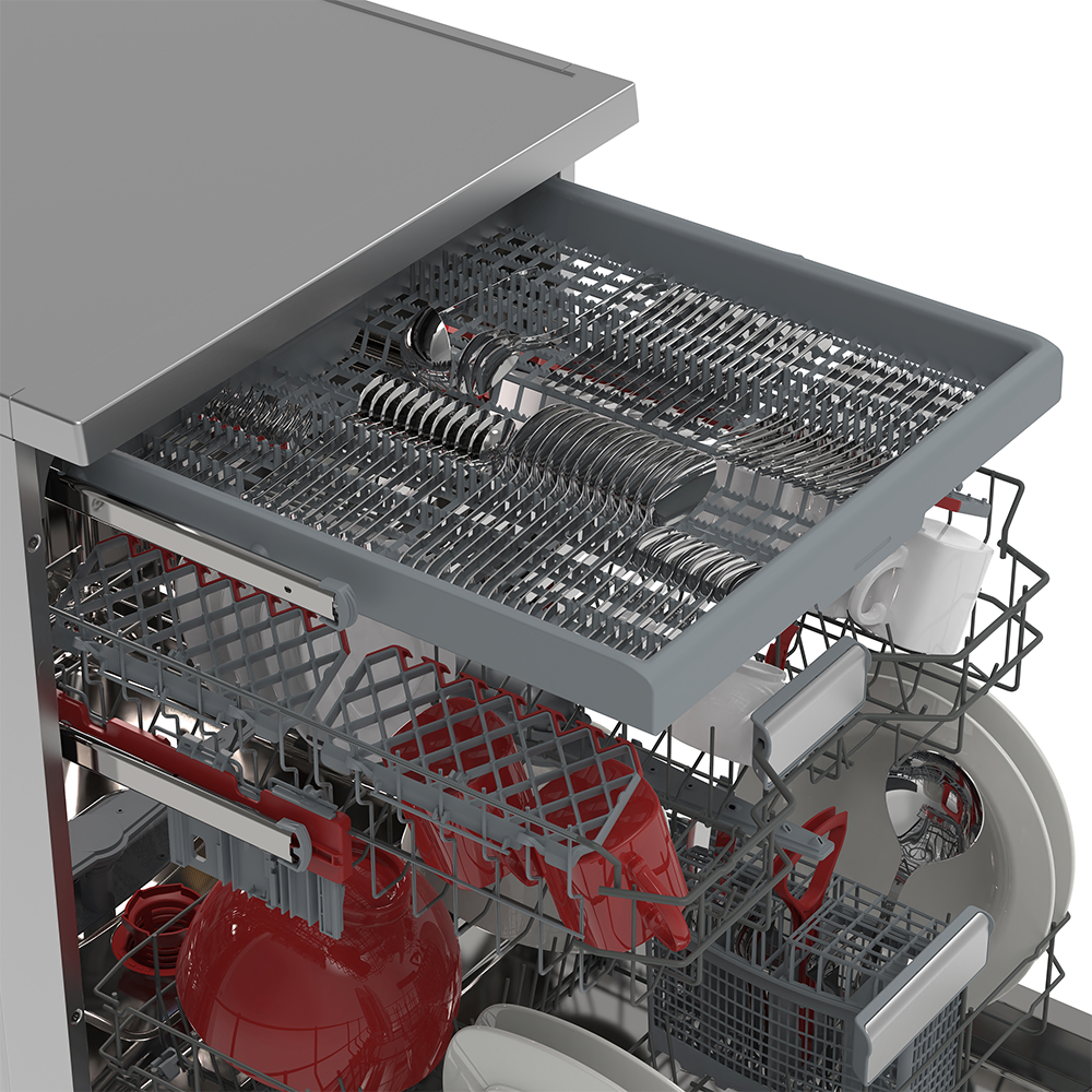 Open dishwasher interior with a full load of dishes, cutlery, and red containers.