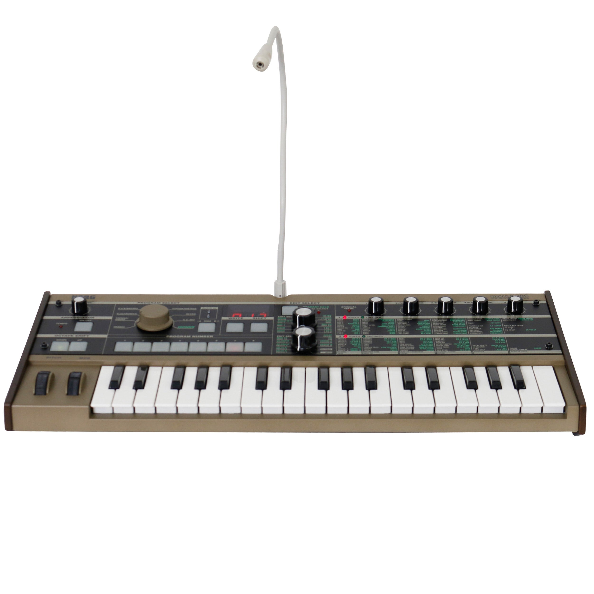 A tan synthesizer with white and black keys and a gooseneck microphone.