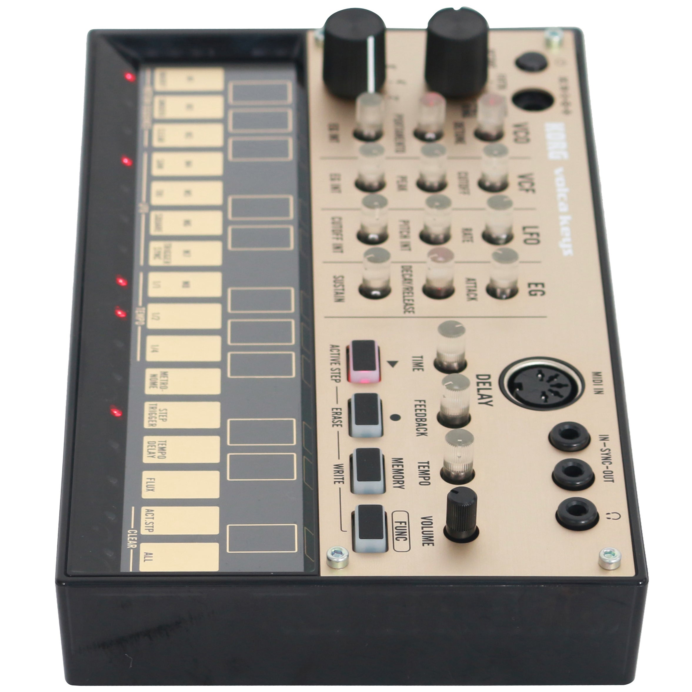 Een gouden Korg Volca Keys synthesizer met zwarte knoppen.