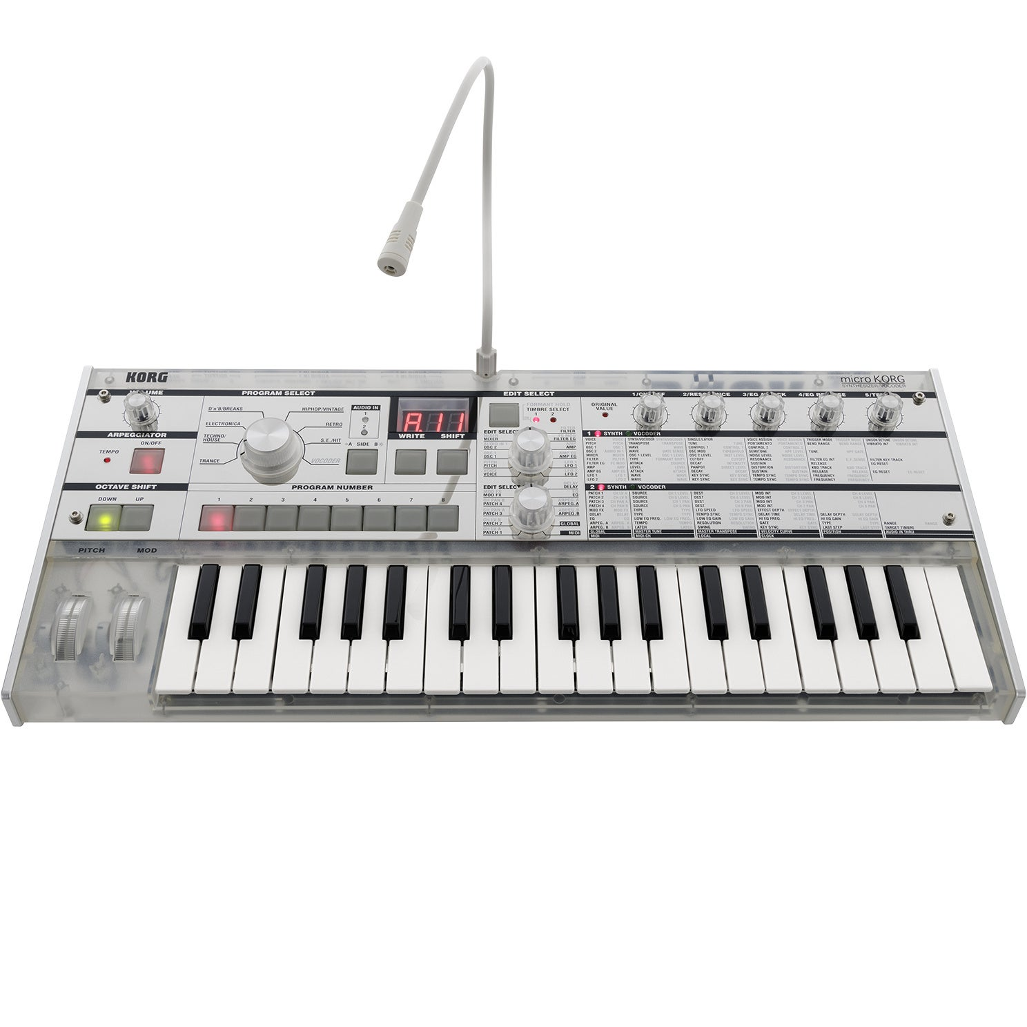 Een zilveren Korg Microkorg synthesizer met een toetsenbord en microfoon.