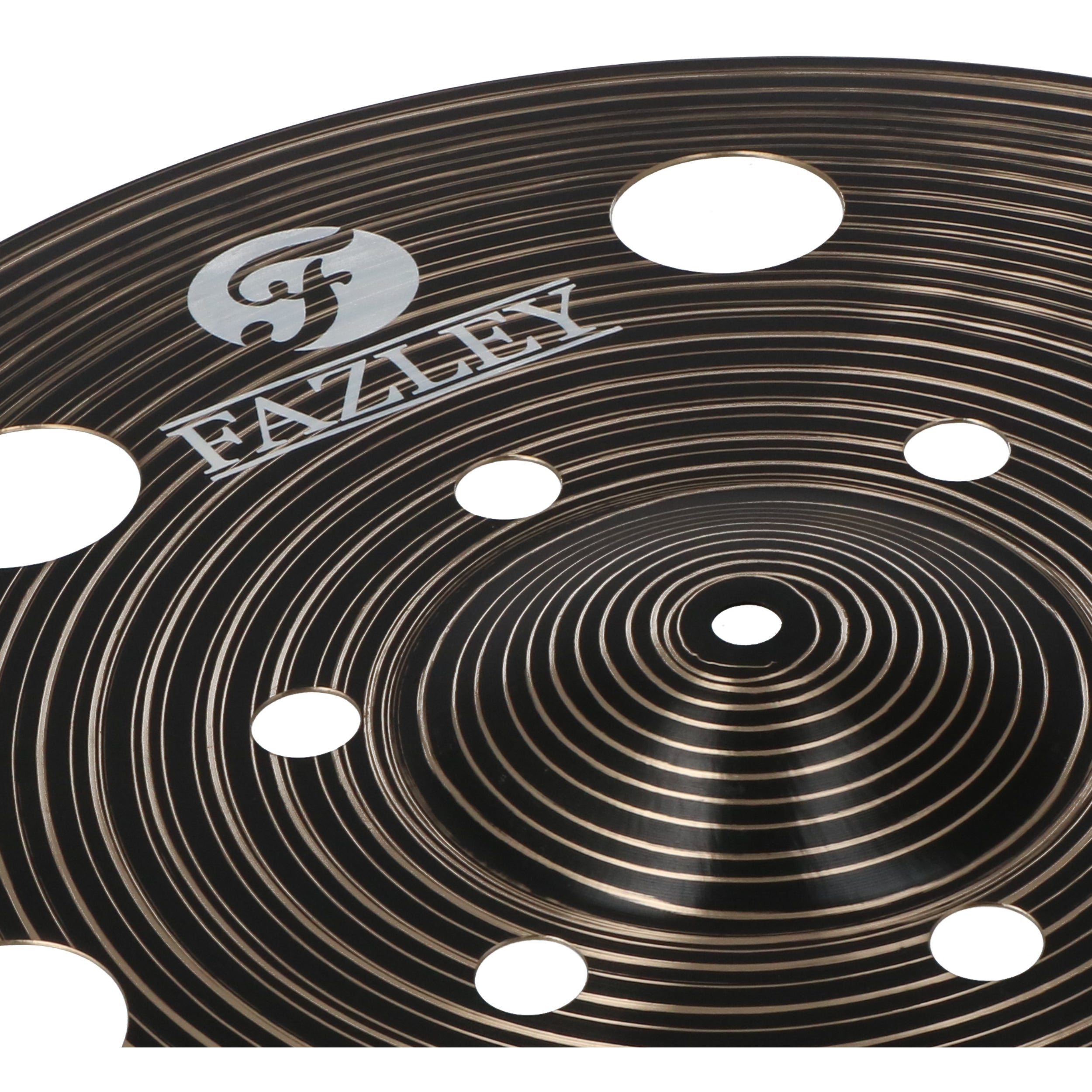 A dark cymbal surface with concentric grooves and round holes.
