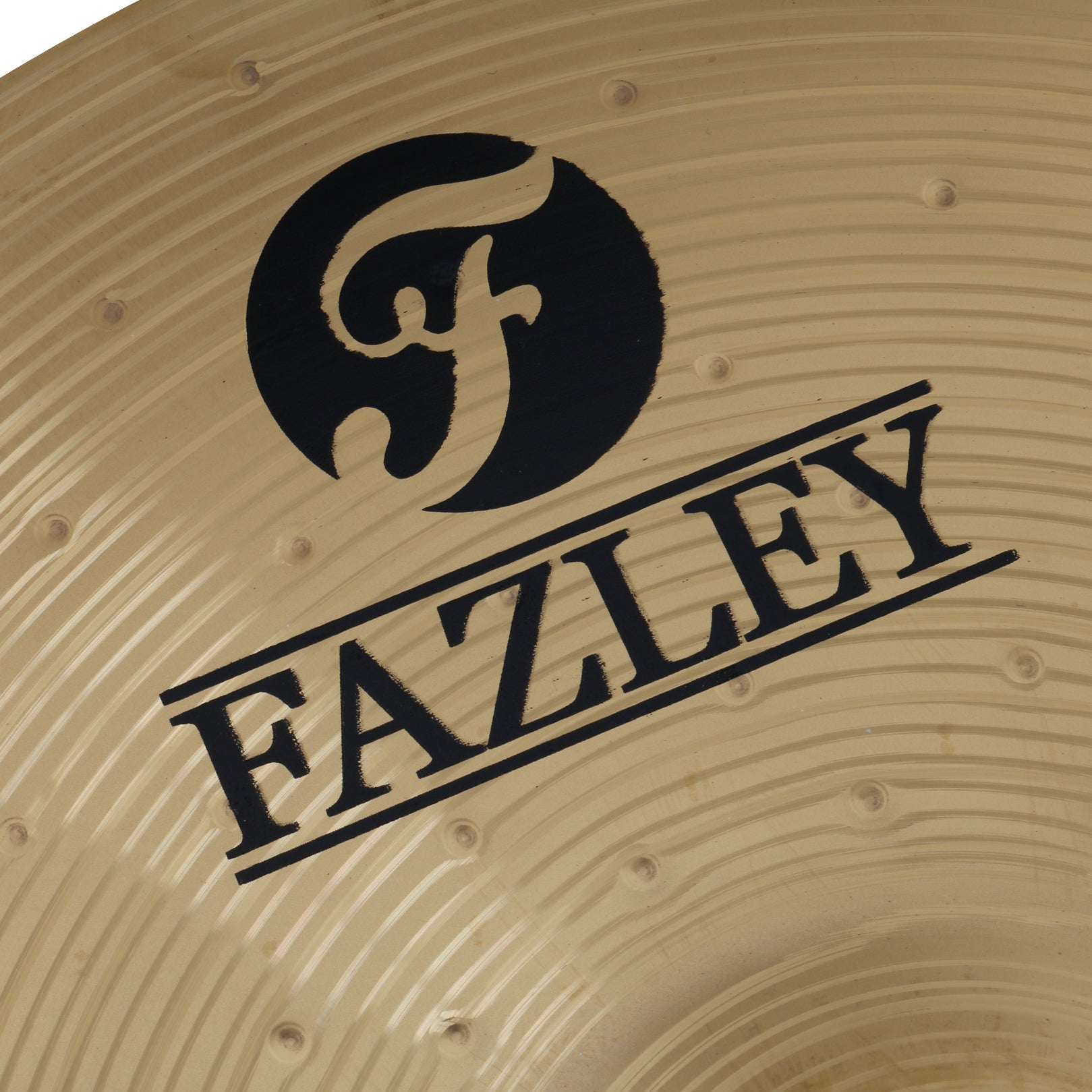 Gold cymbal with black logo and FAZLEY lettering.