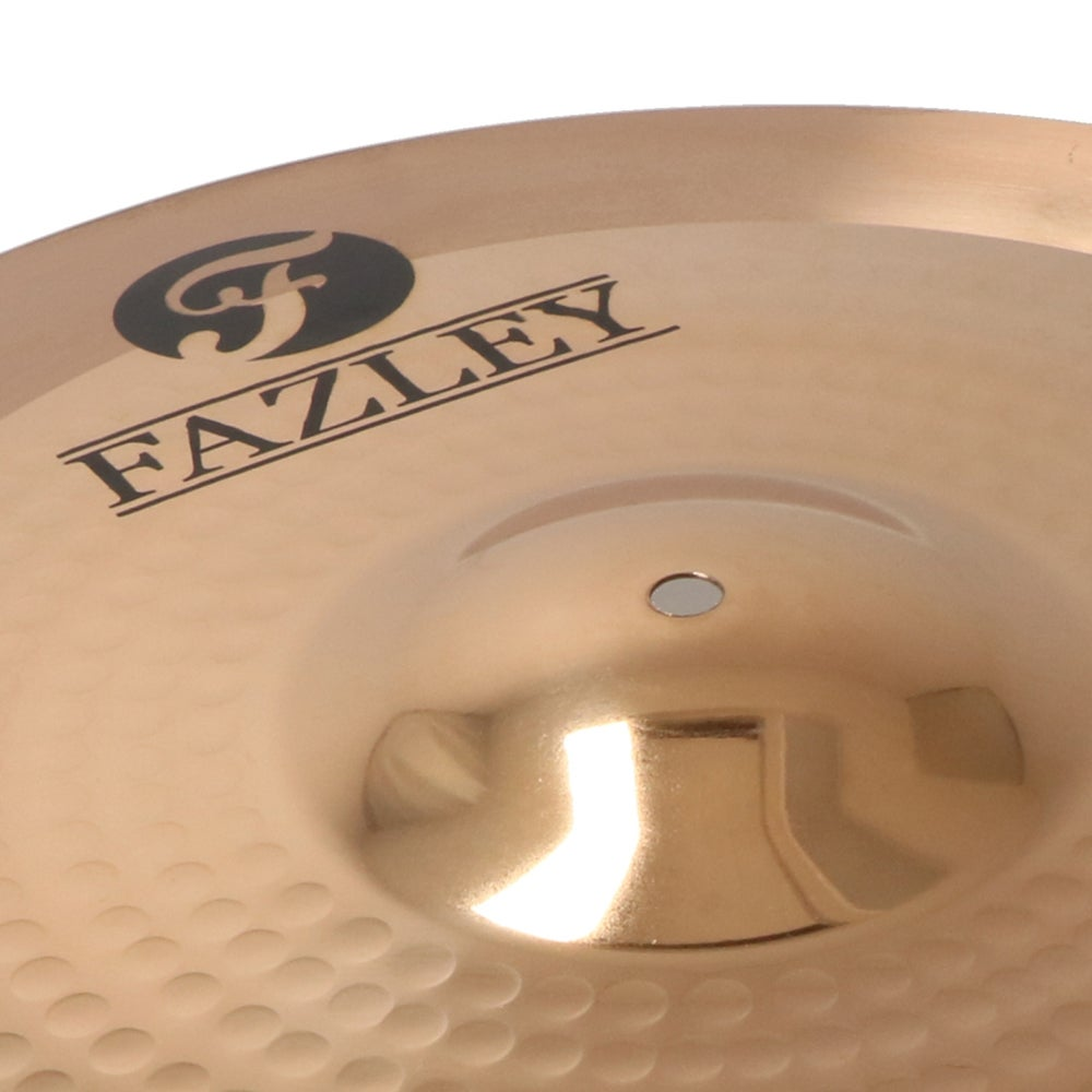 A golden cymbal with the "FAZLEY" logo and a small hole in the center.