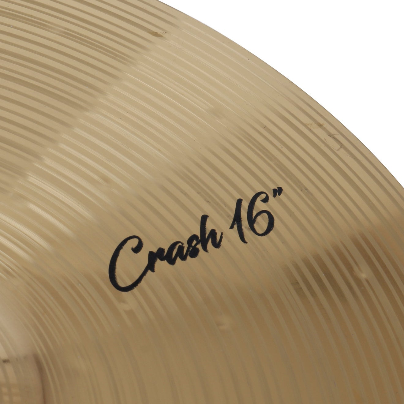 Close-up of a golden cymbal with "Crash 16" written on it.