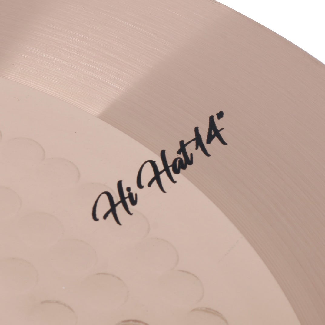 Close-up of a light brown cymbal with black text reading "Hi Hat 14".