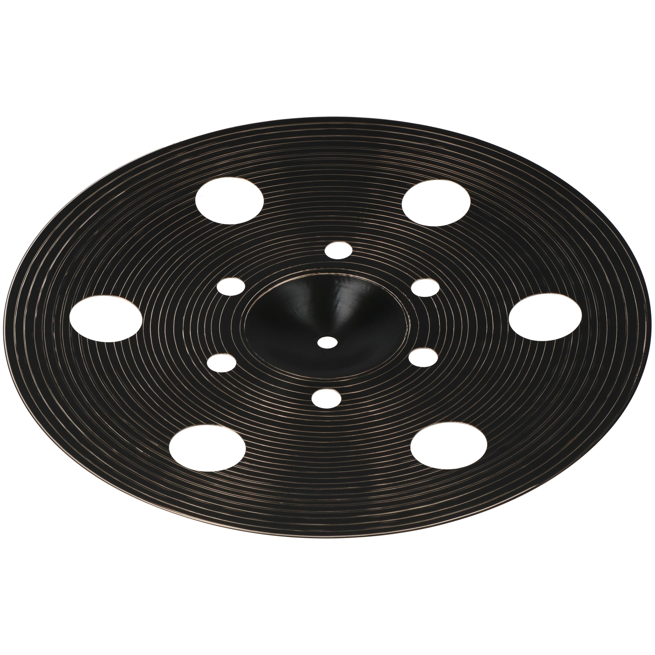 Dark cymbal with circular grooves and six round holes.