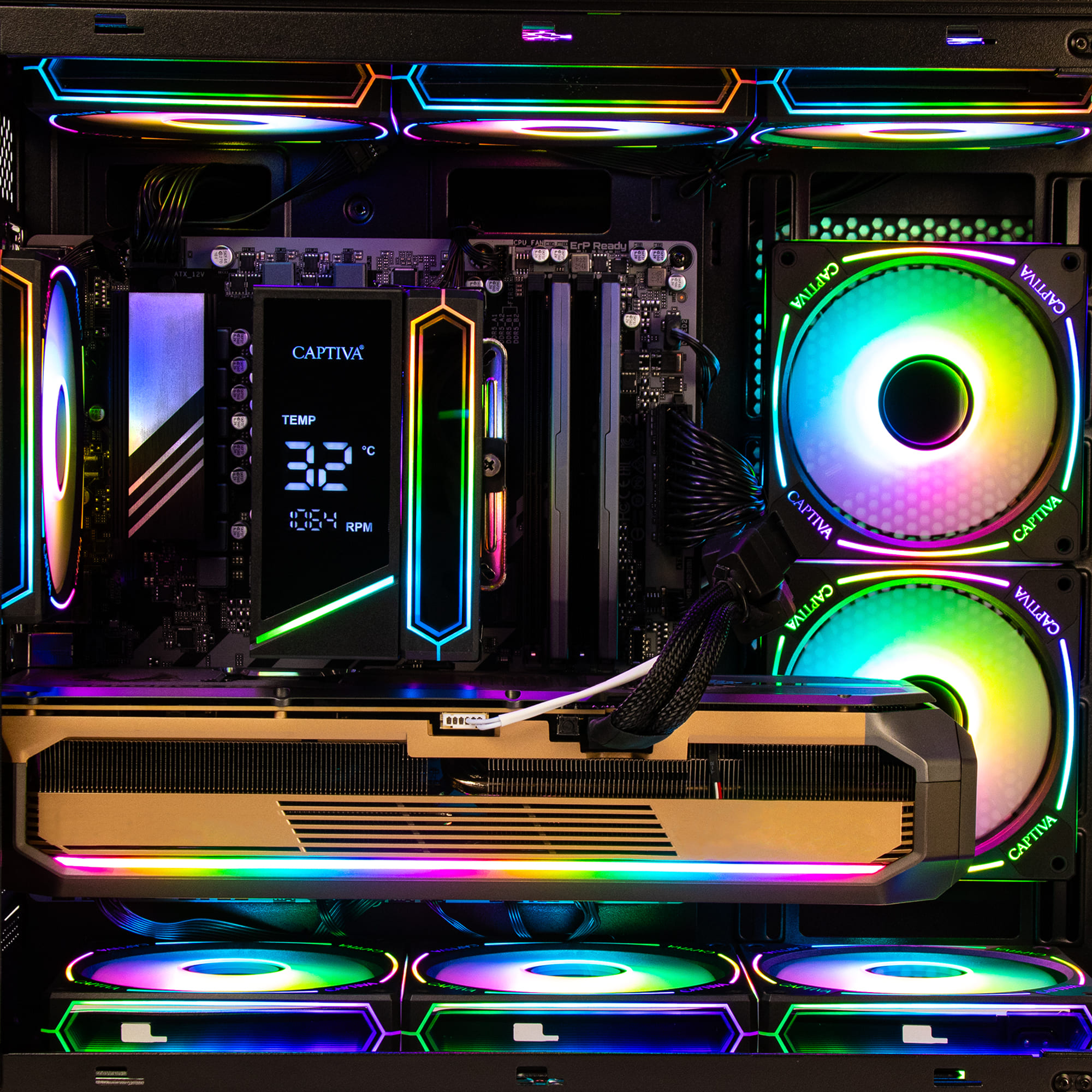 Un boîtier PC avec ventilateurs RVB, carte graphique et carte mère.
