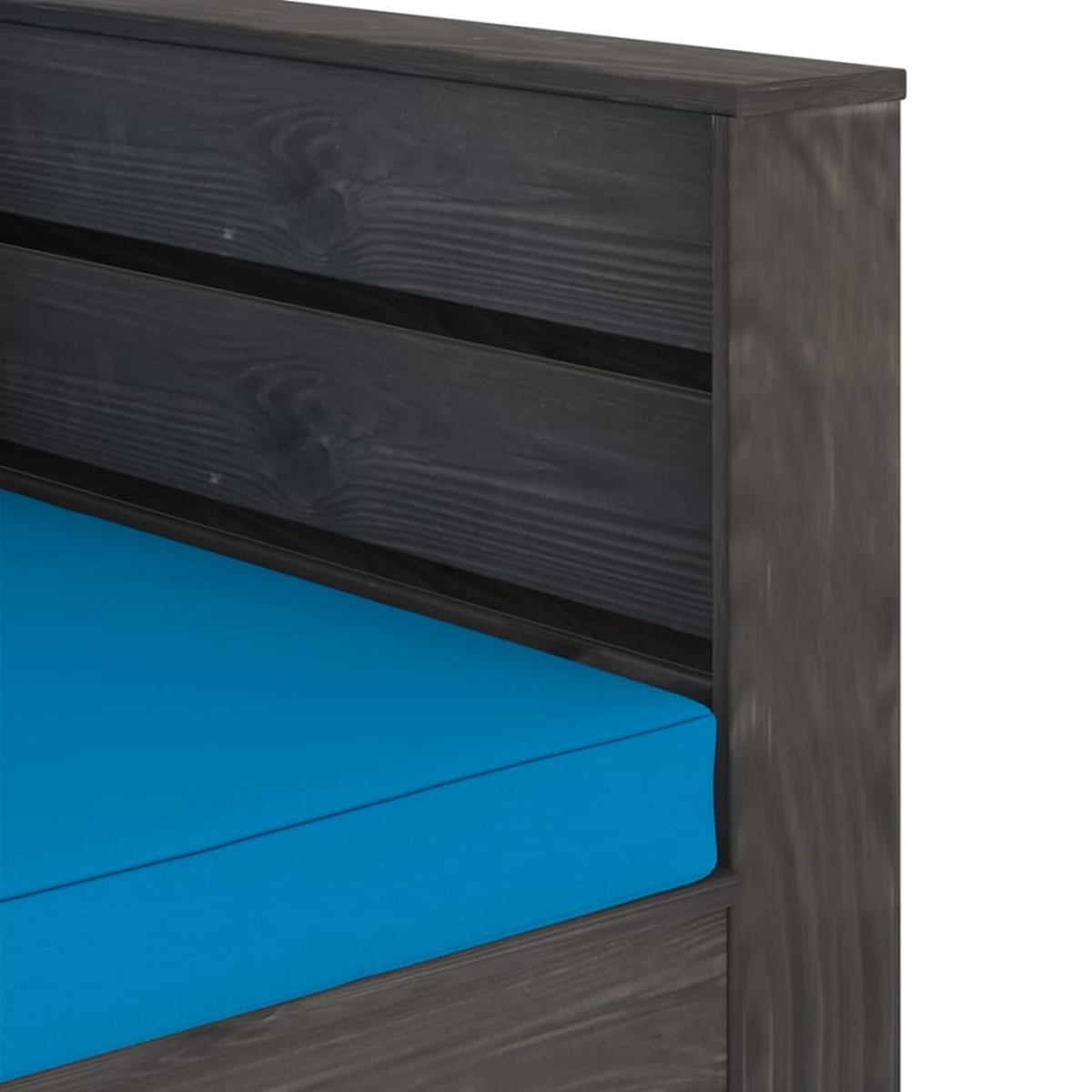 Ein dunkles Holzgestell mit einer leuchtend blauen Matratze.