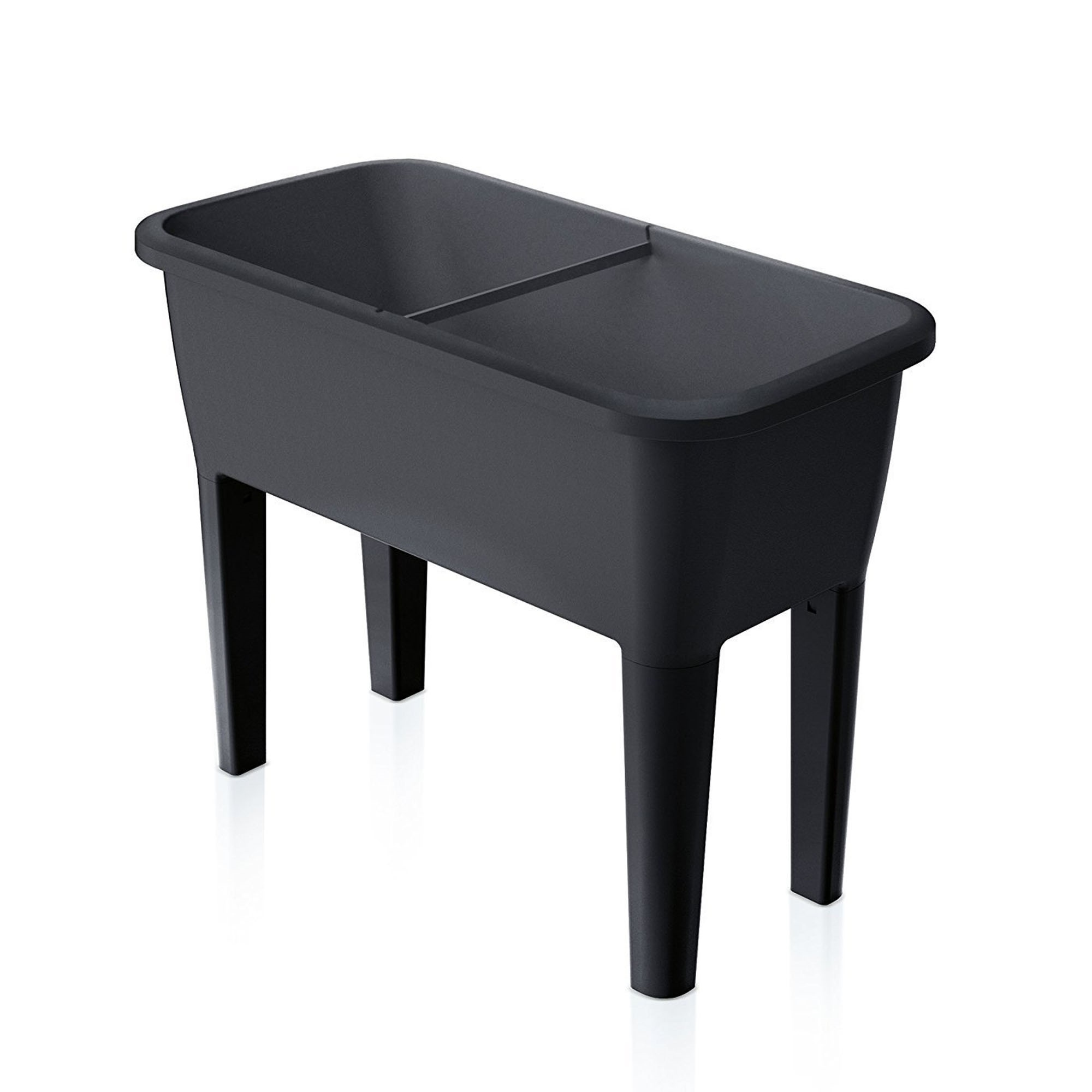 Una mesa de plantación rectangular oscura sobre cuatro patas.