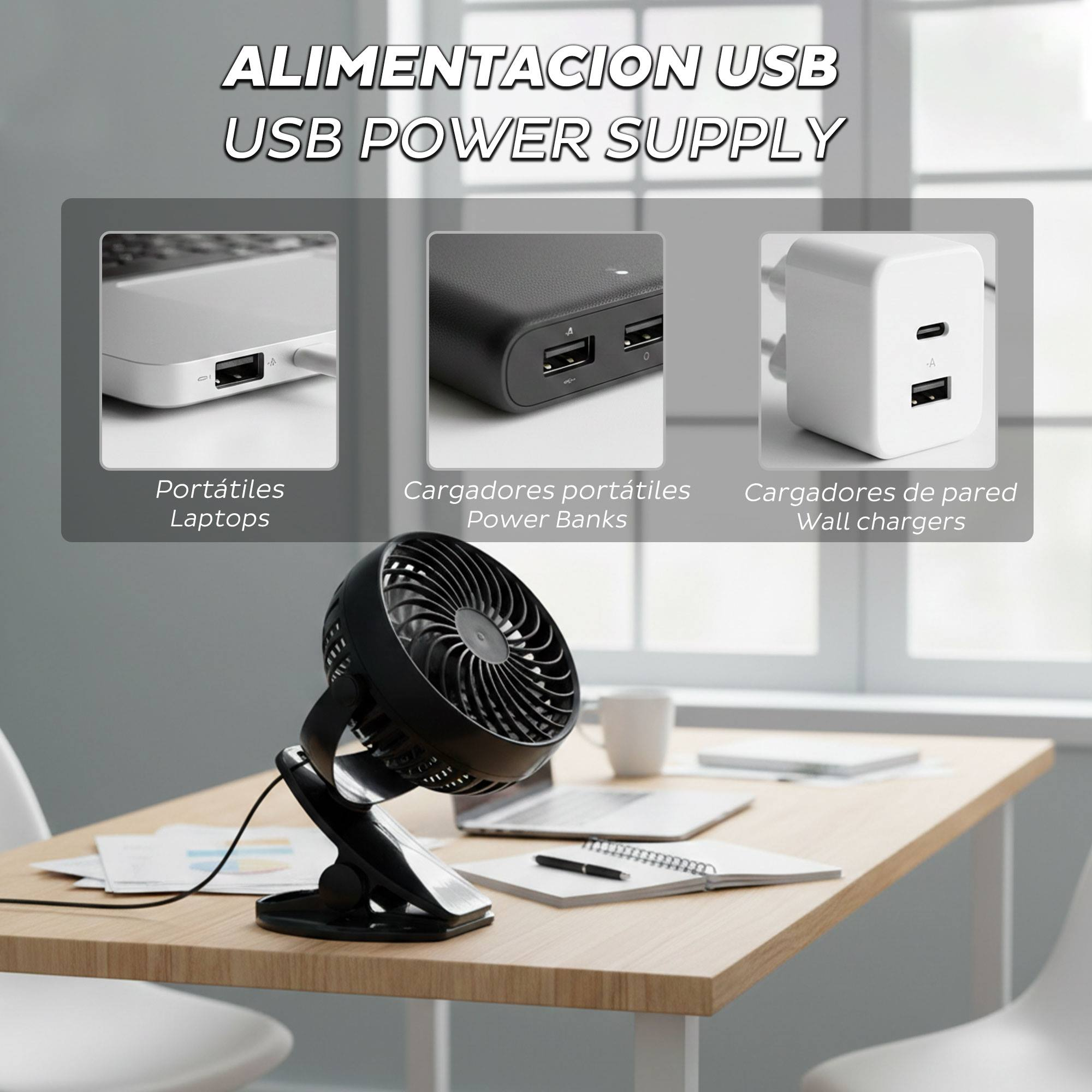 Un ventilador negro sobre un escritorio con portátiles, cuadernos y tazas.