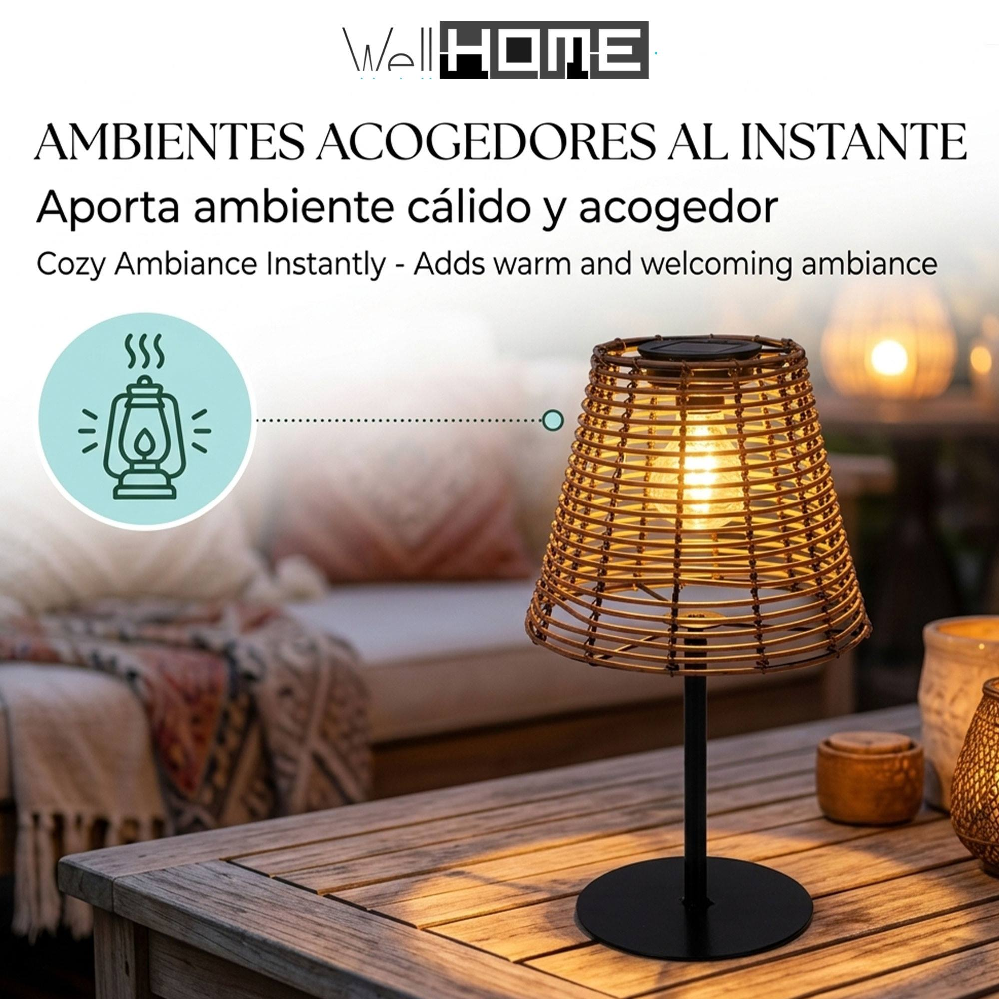 Lámpara de mesa con pantalla tejida, al aire libre por la noche.