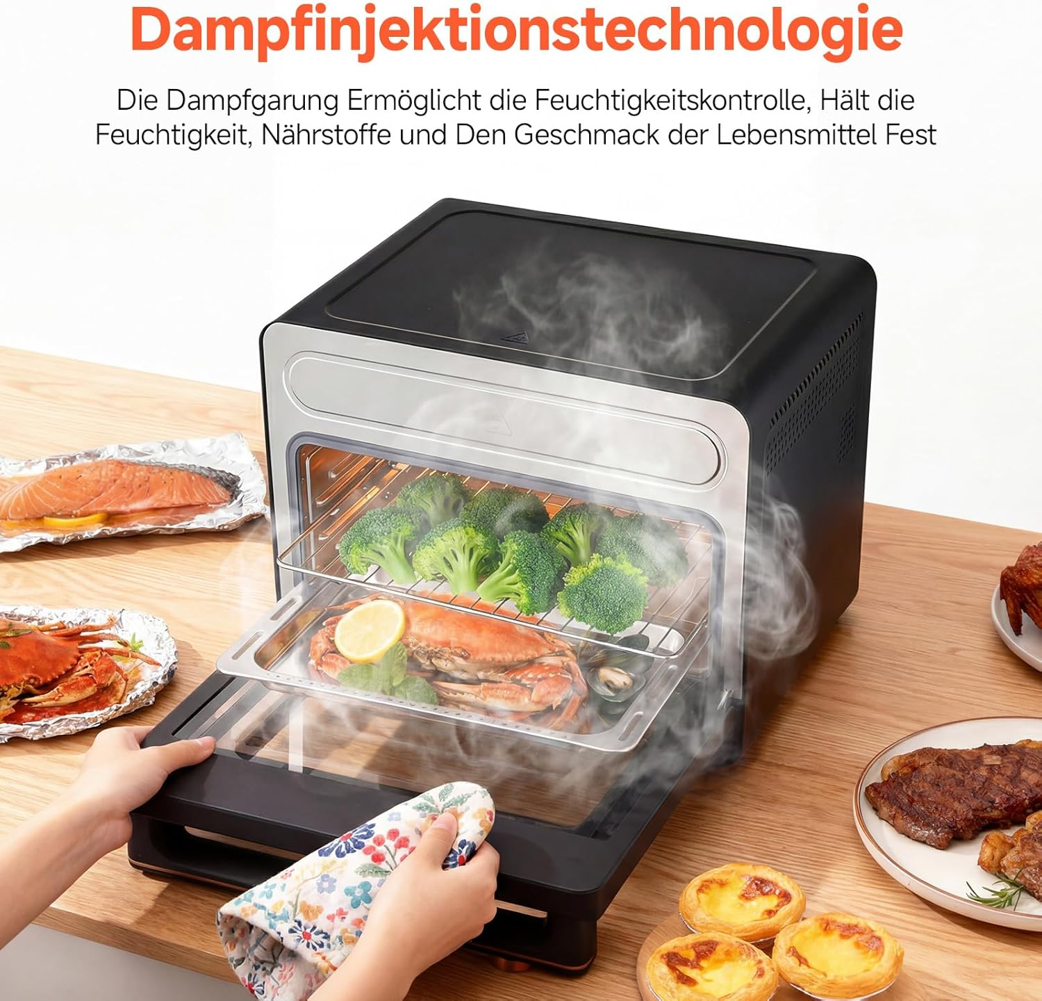 Ein Dampfgarer mit Lachs, Krabben, Brokkoli, Steak und Gebäck.