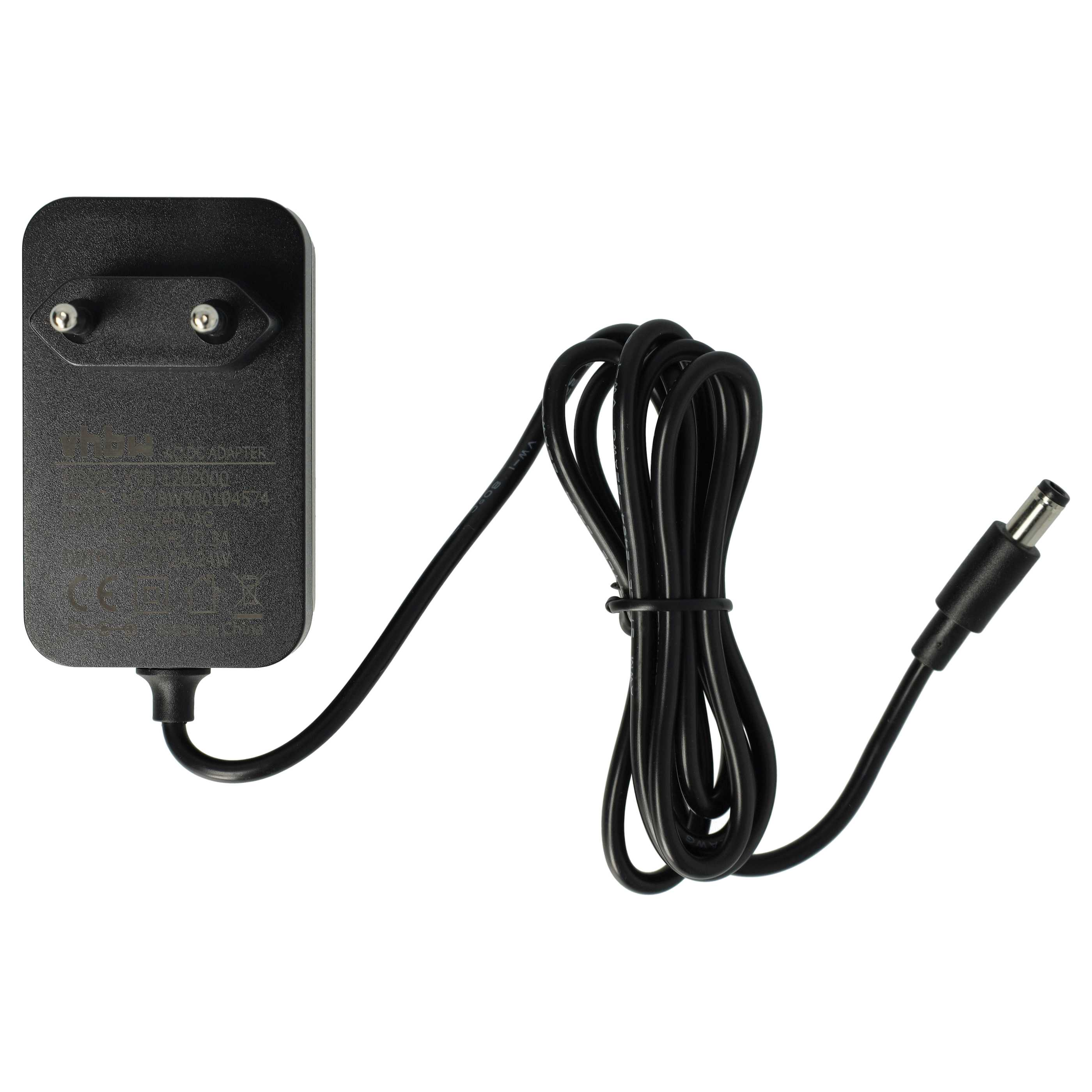Ein schwarzes Netzteil mit zwei Pins und einem gewickelten Kabel.