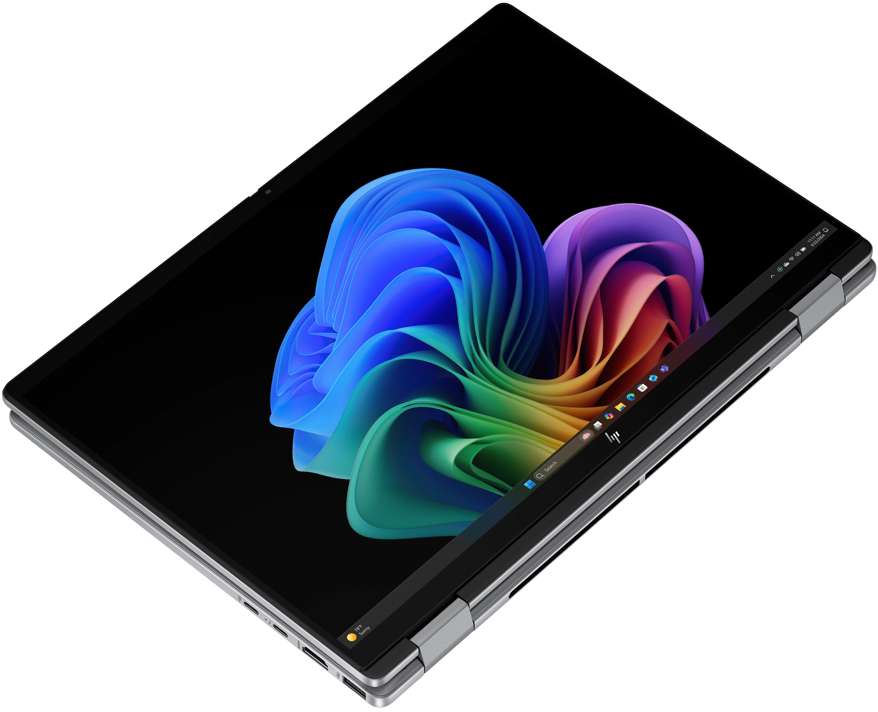 Ein geöffneter Laptop mit einem bunten Hintergrundbild. Links sind Anschlüsse.