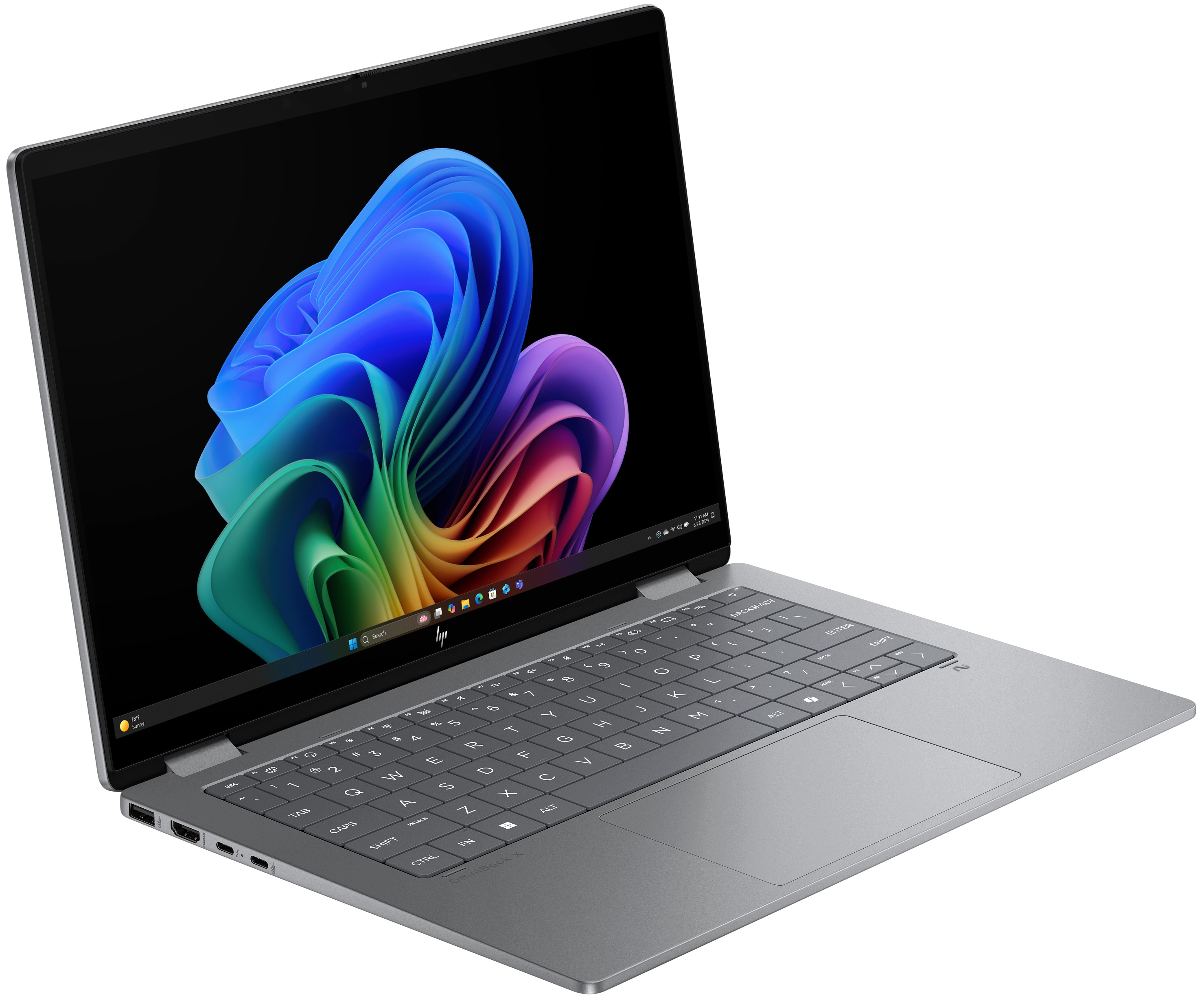 Ein silberner Laptop mit einem bunten Hintergrundbild auf dem Bildschirm.