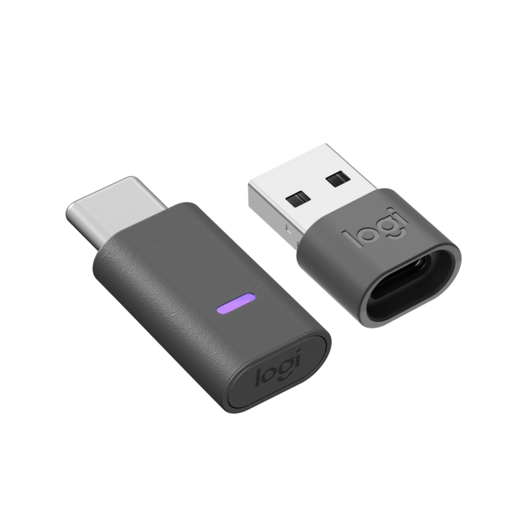 Zwei dunkelgraue Logitech USB-Adapter. Einer ist USB-A, der andere USB-C.