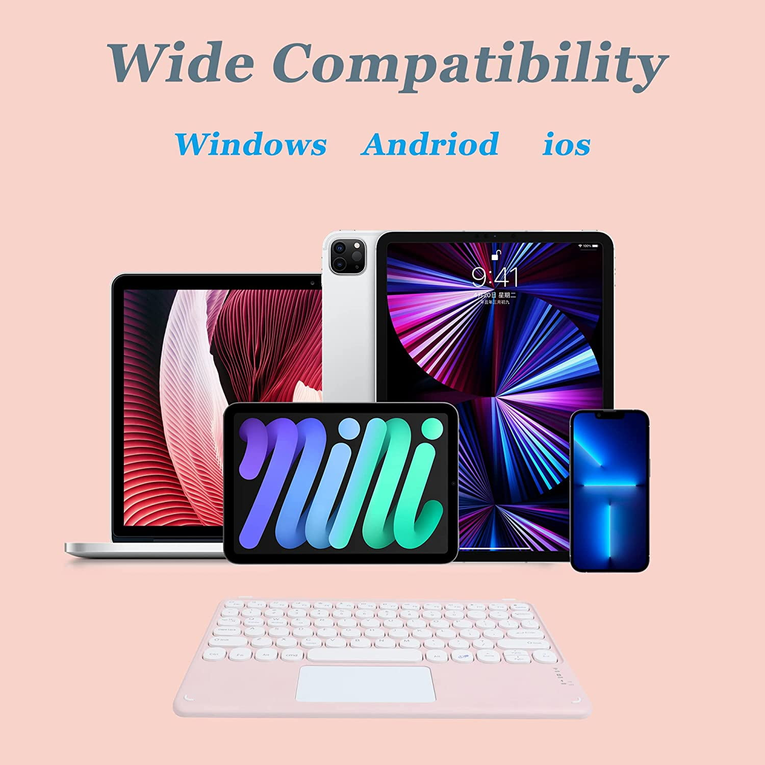 Ein Laptop, zwei iPads, ein iPhone und eine Tastatur auf rosa Hintergrund.