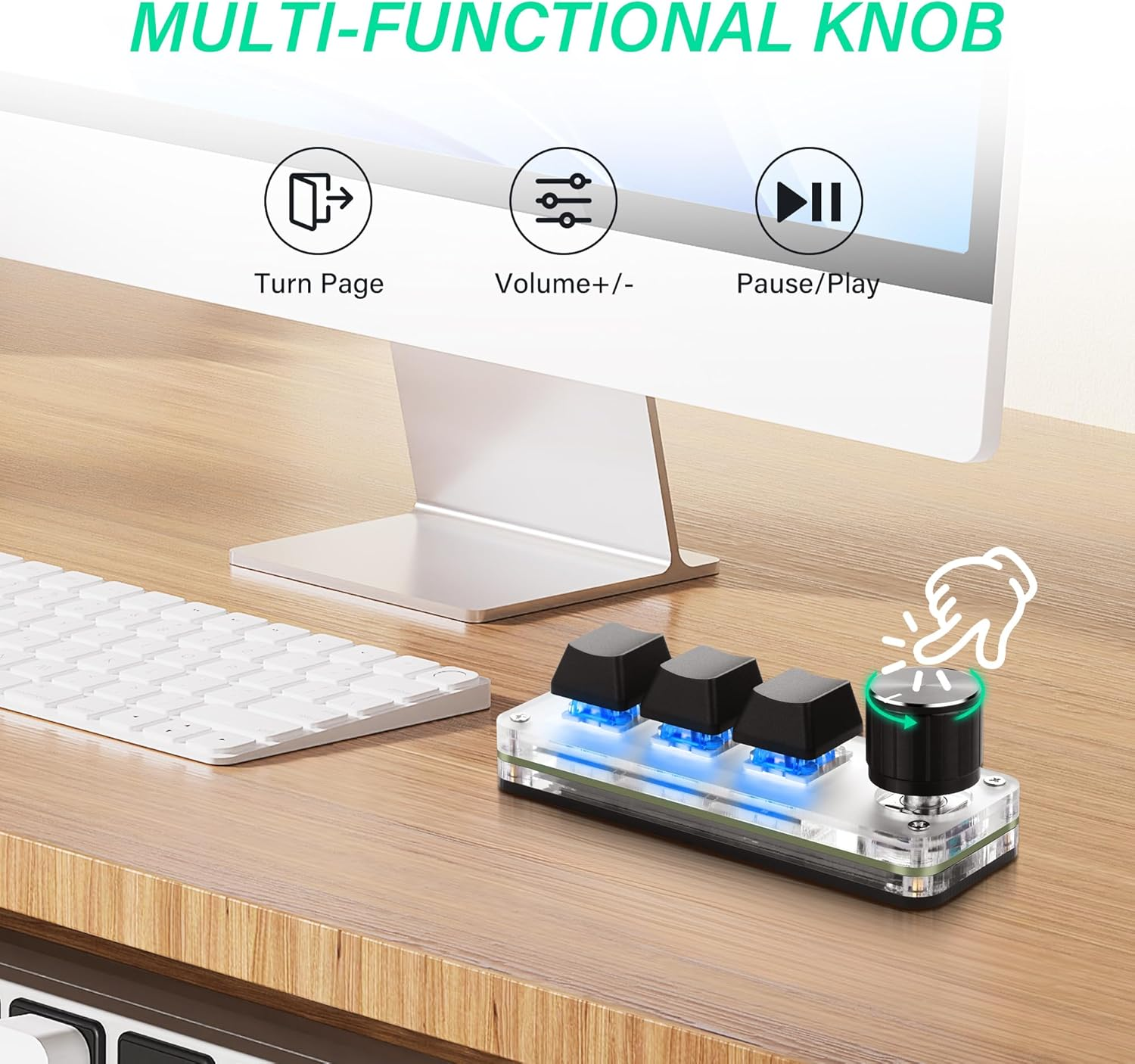 Ein Desktop-Setup mit Tastatur, Monitor und einem multifunktionalen Drehknopf mit drei Tasten.
