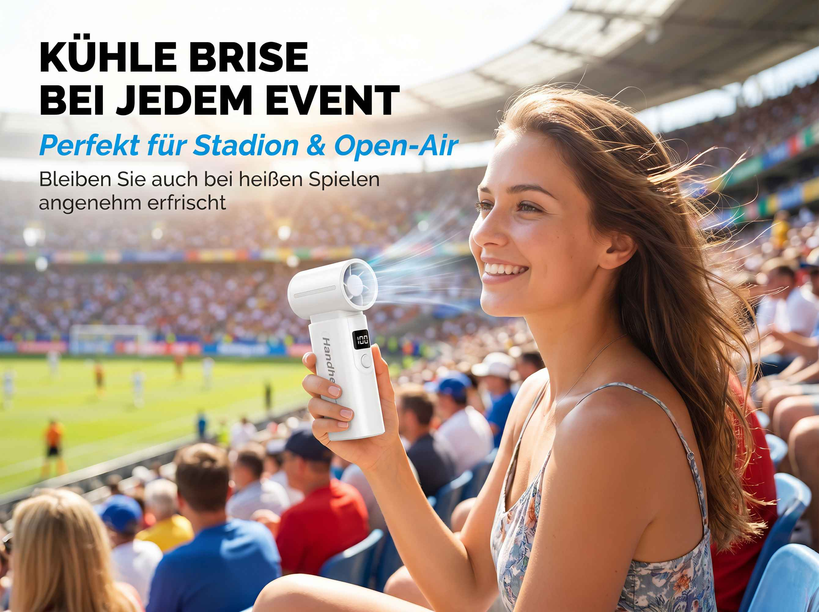 Frau im Stadion hält einen weißen Ventilator, der Luft bläst.
