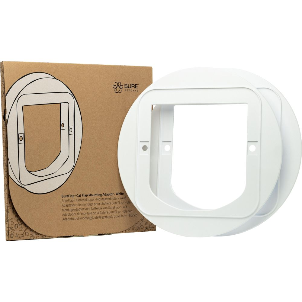 A white SureFlap Cat Flap mounting adapter is shown next to its packaging.