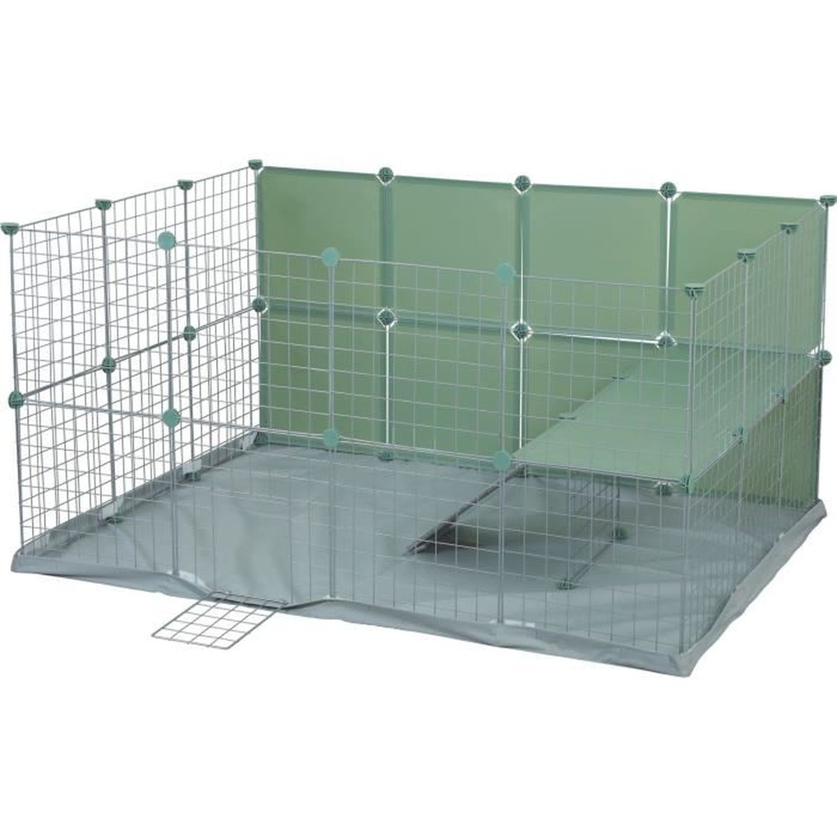 A wire cage enclosure with green panels, a ramp, and a mat.