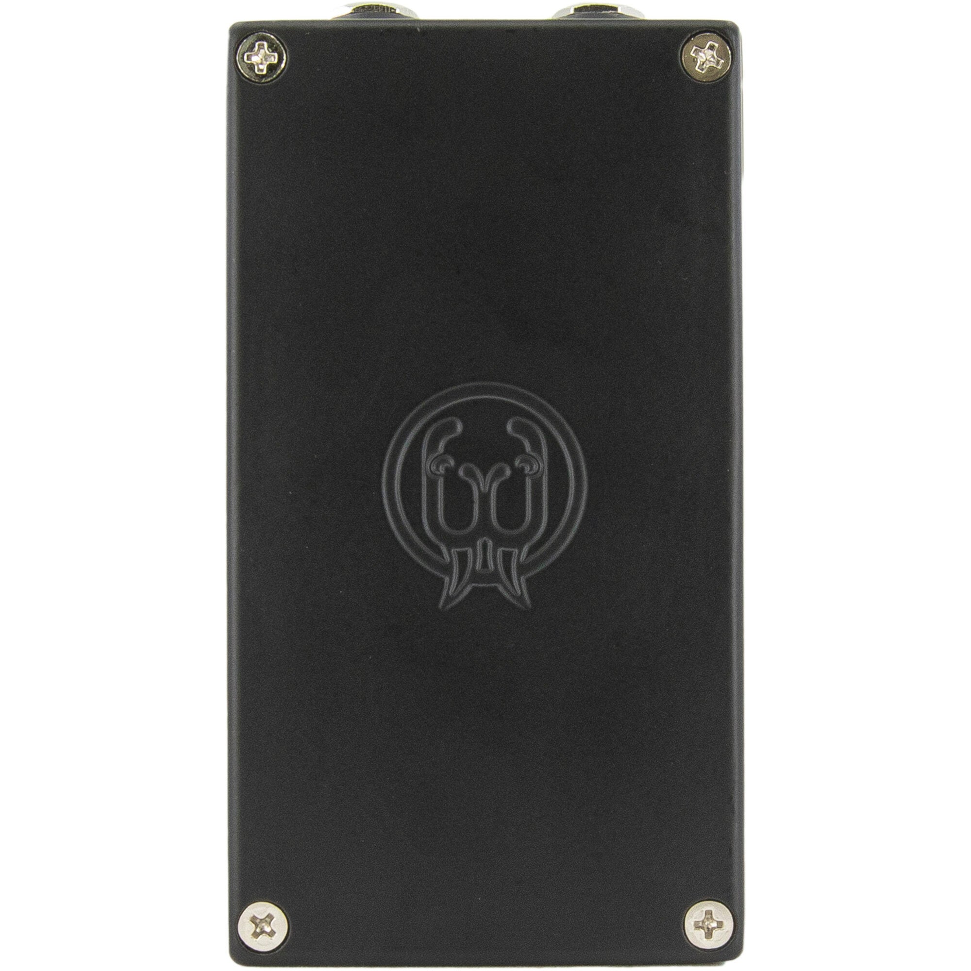 Black rectangular pedal with embossed circular logo on white background.