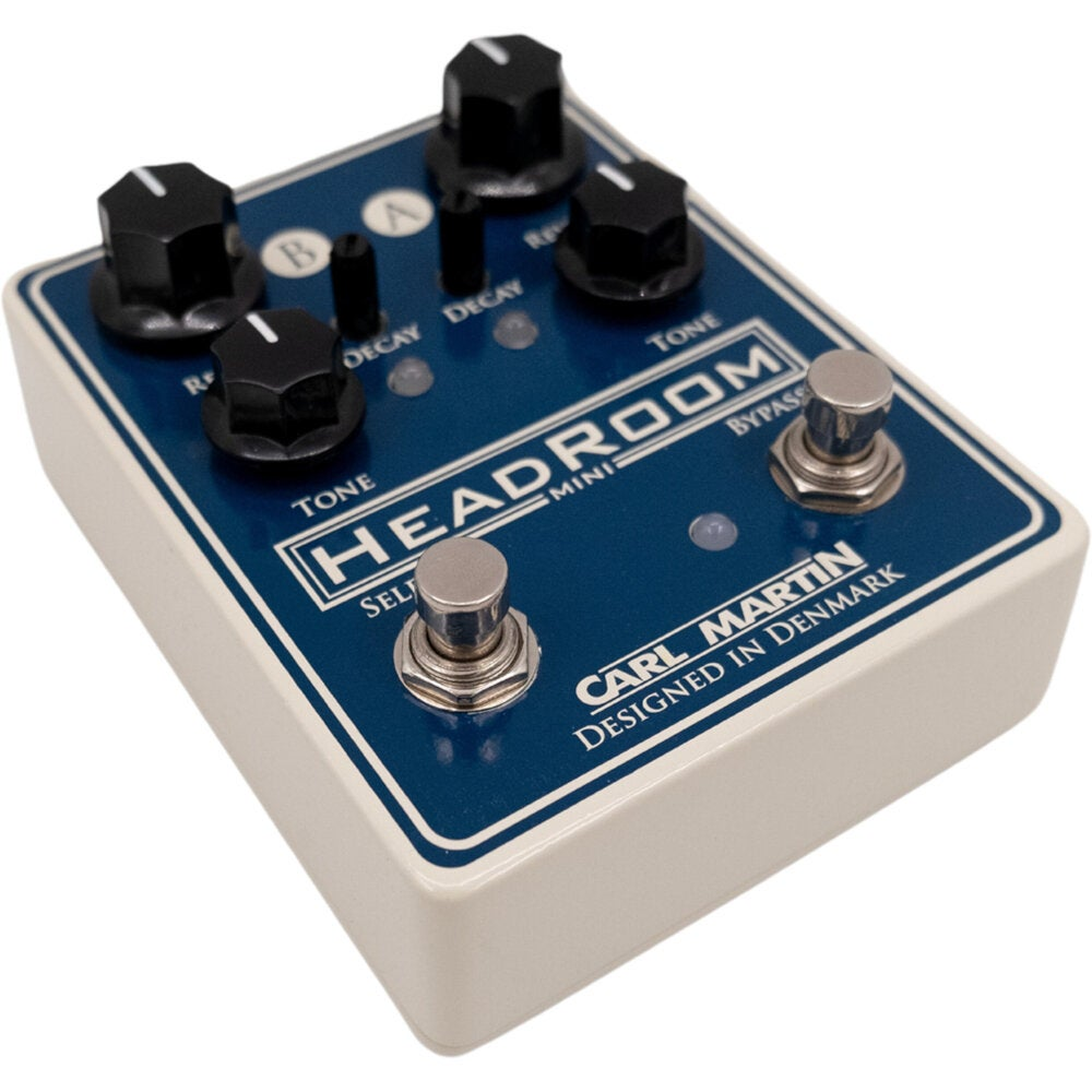 A blue Carl Martin Headroom Mini effect pedal with four black knobs and two footswitches.