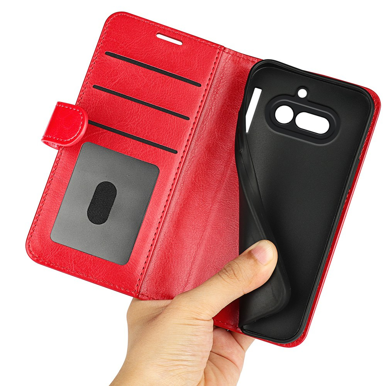 Een rode telefoonportemonnee in een hand. De binnenkant is zwart.