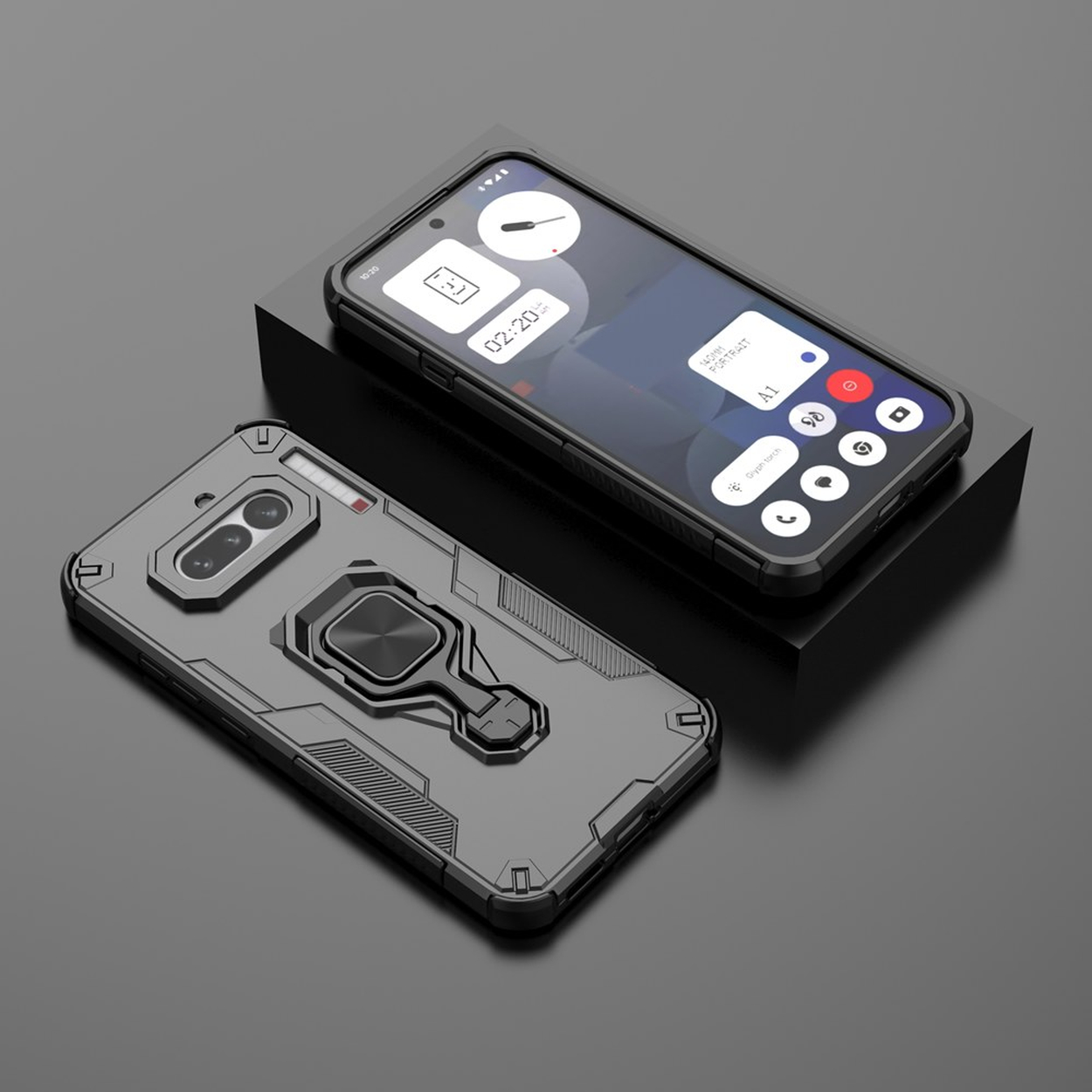 Un smartphone gris avec étui et support anneau sur fond sombre.