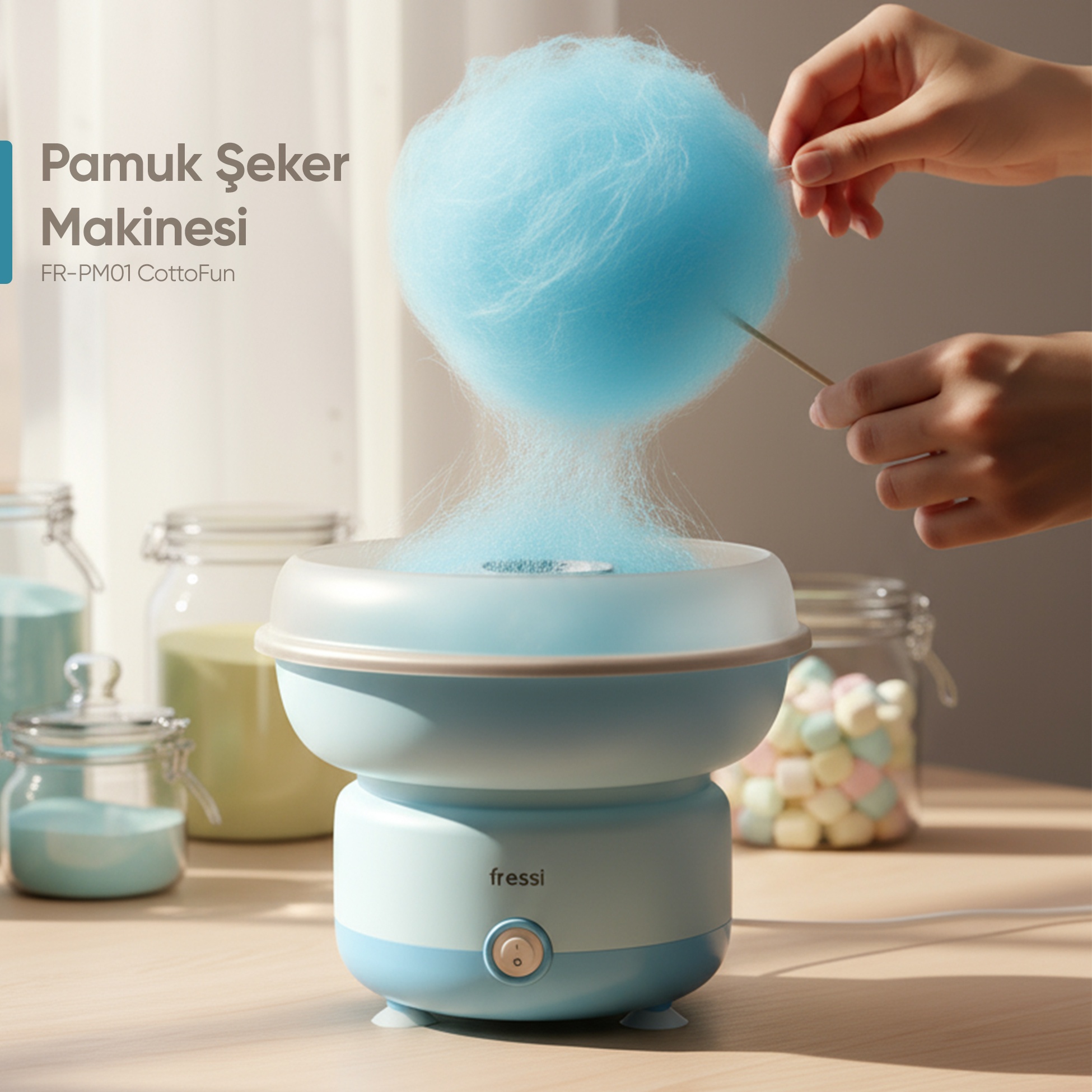 Mavi bir pamuk şeker makinesi mavi pamuk şeker yapıyor. Yanında şeker kavanozları var.