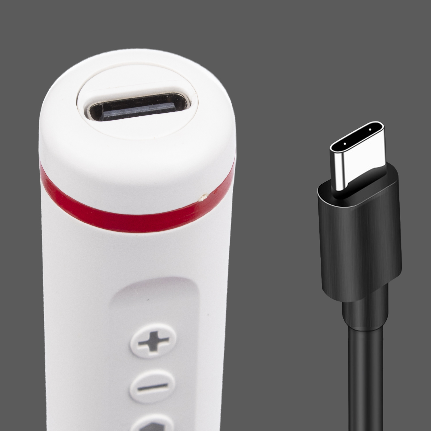 Ein weißes Gerät mit rotem Streifen und ein schwarzes USB-C-Kabel.