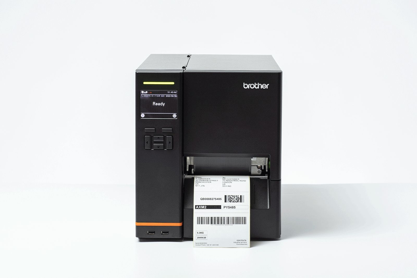 Black Brother label printer with a printed shipping label on a white background.