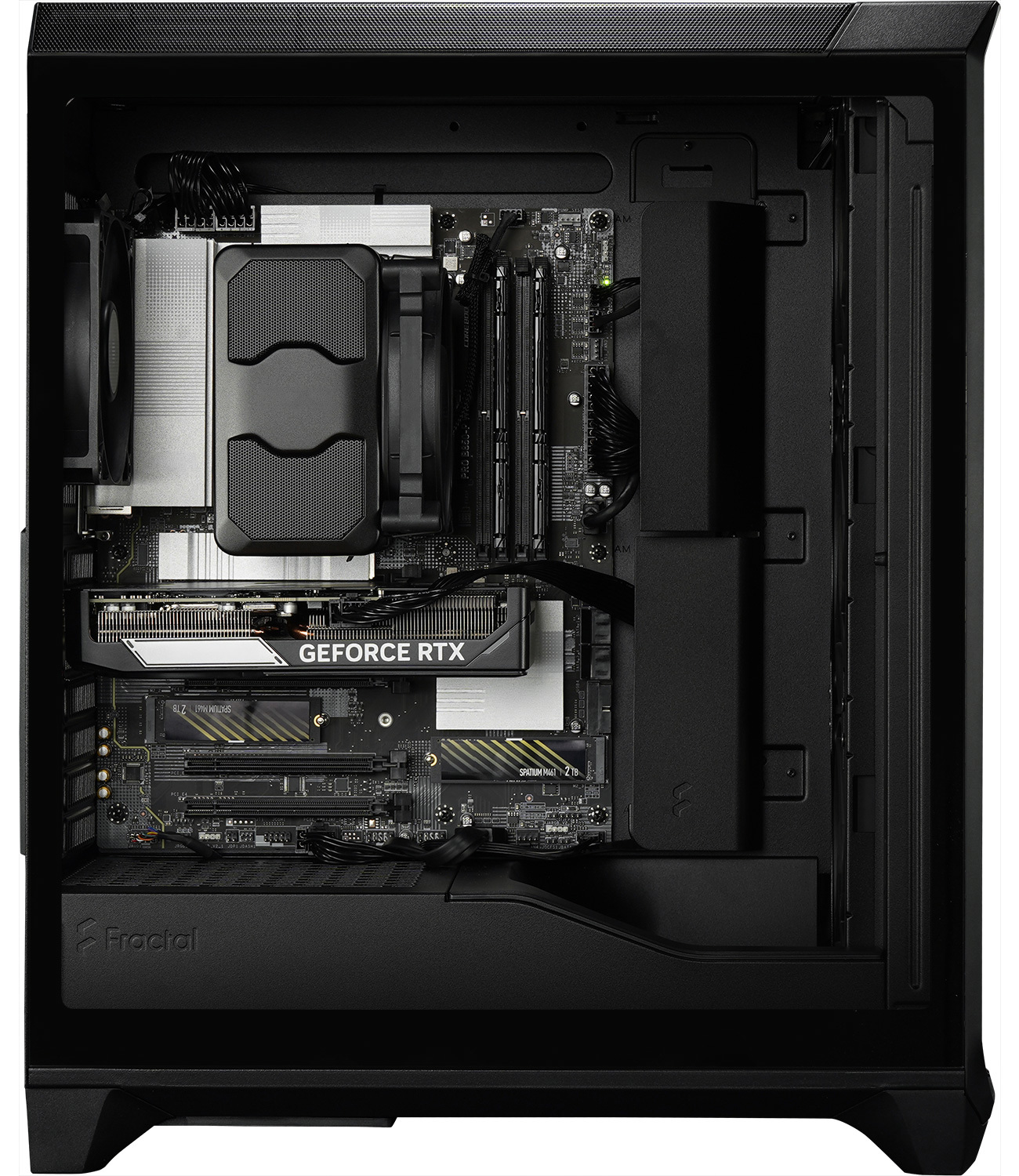 Inside view of a black PC case showing motherboard, GPU, CPU cooler and Fractal logo.