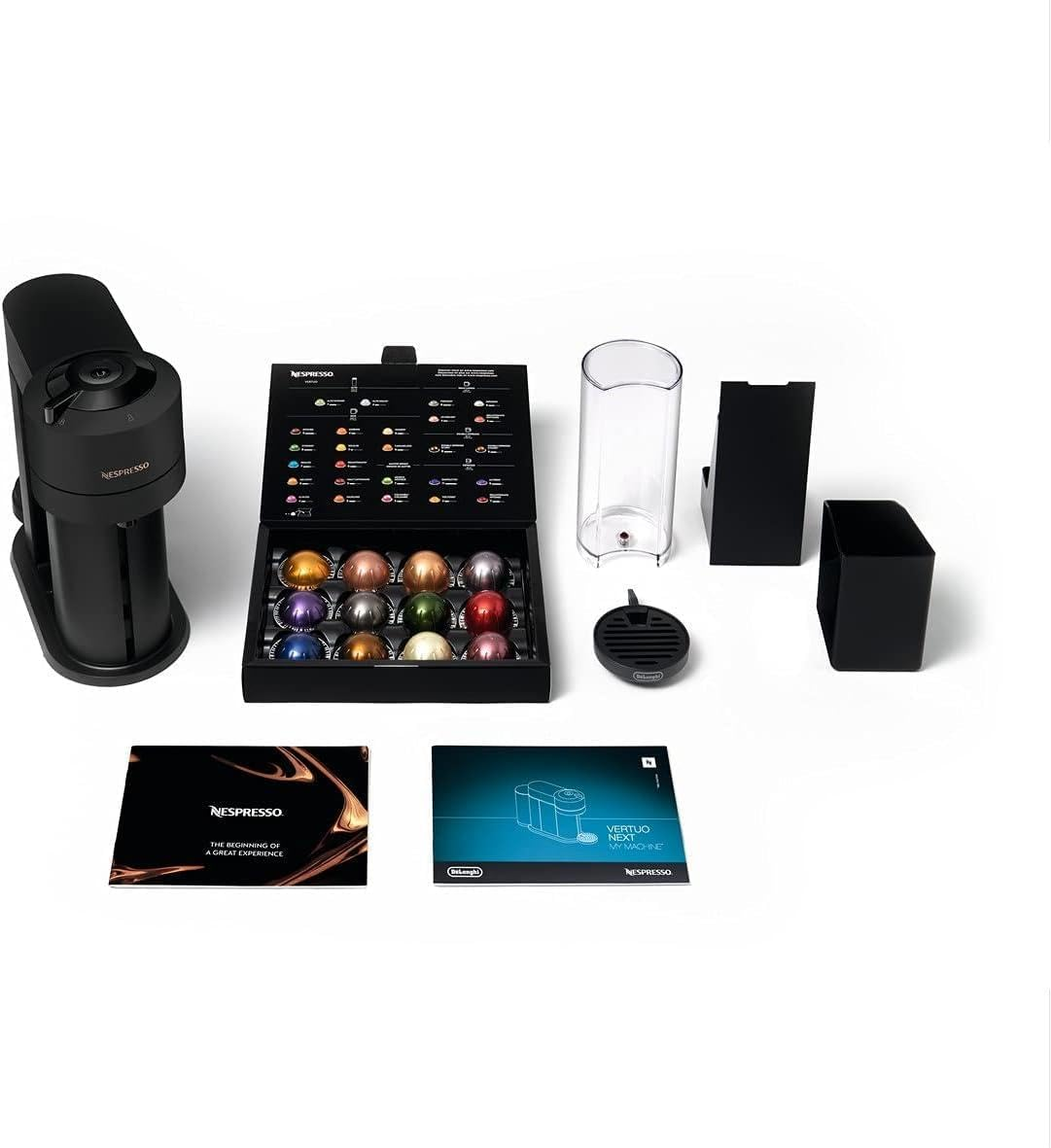Cafetera Nespresso Vertuo con cápsulas, accesorios y manuales.