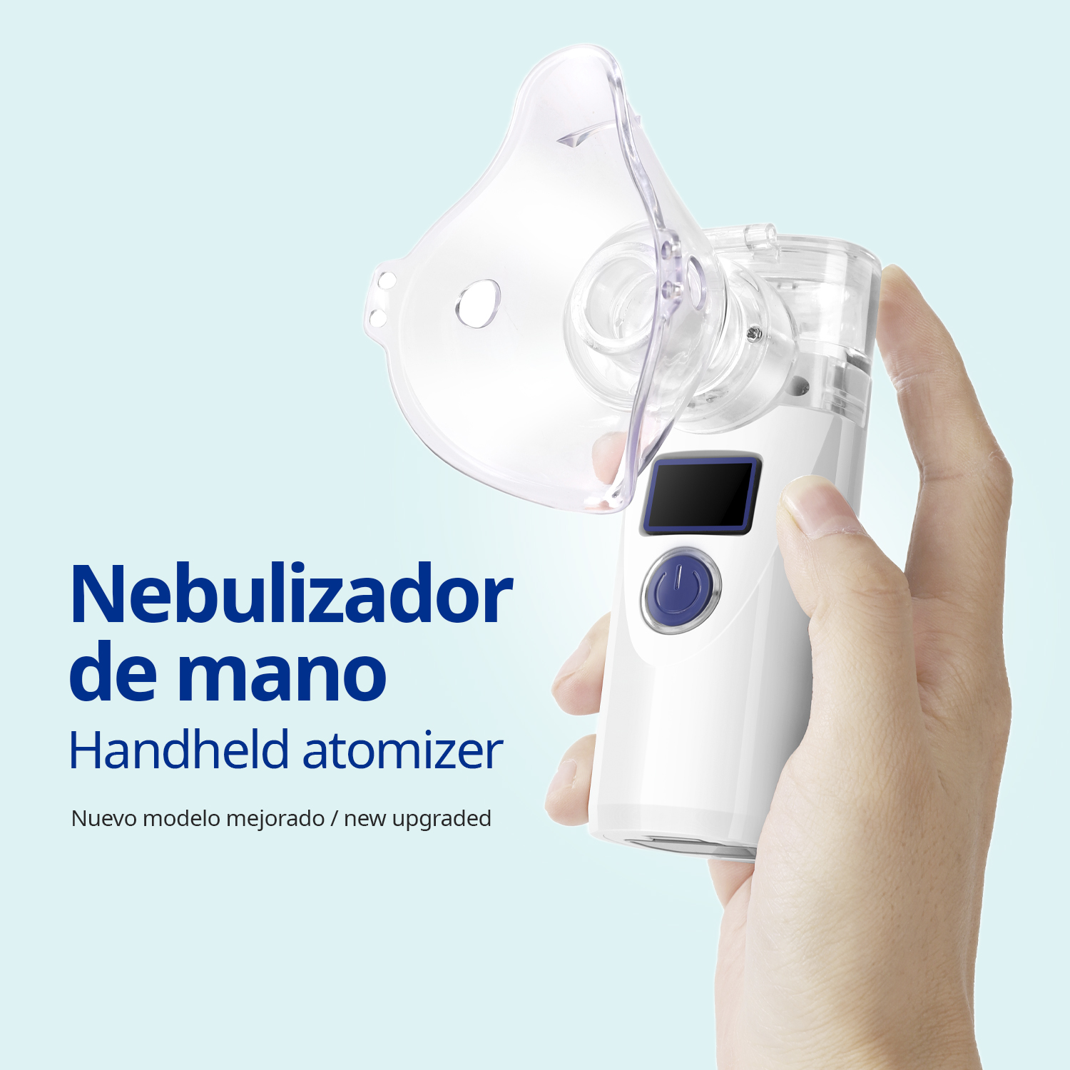 Una mano sostiene un atomizador de mano blanco con mascarilla transparente.