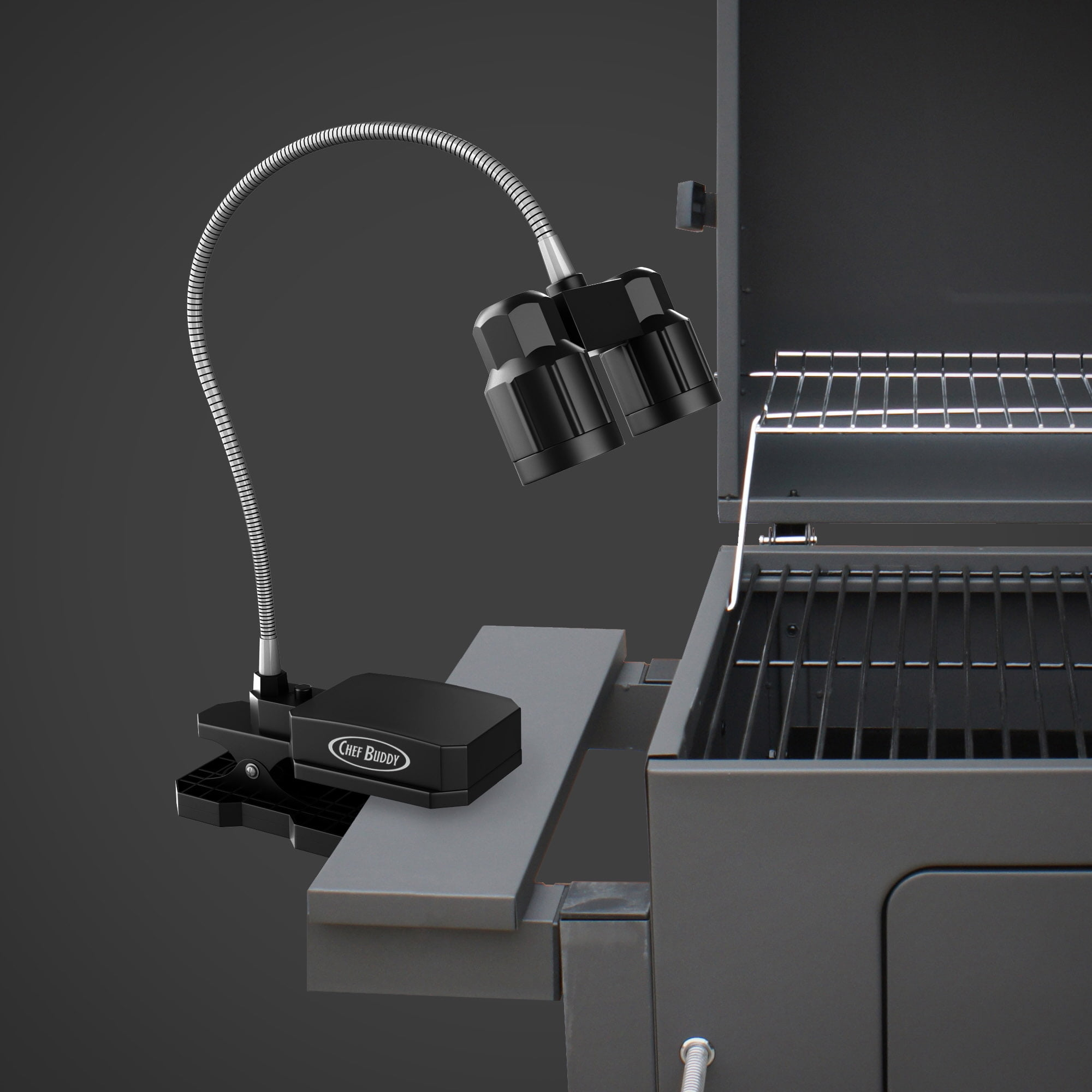 Grilllicht mit flexibler Halterung und zwei LEDs, befestigt an einem grauen Grill.