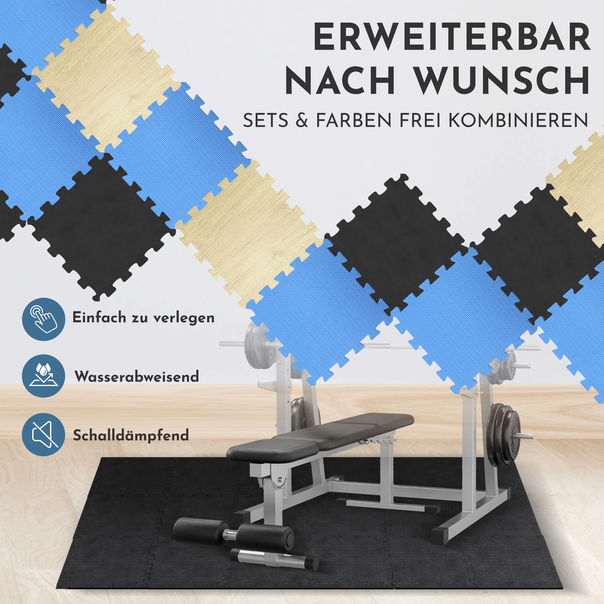 Puzzle-Matten in Blau, Schwarz, Beige und Weiß ergeben ein Muster über einem Trainingsgerät.