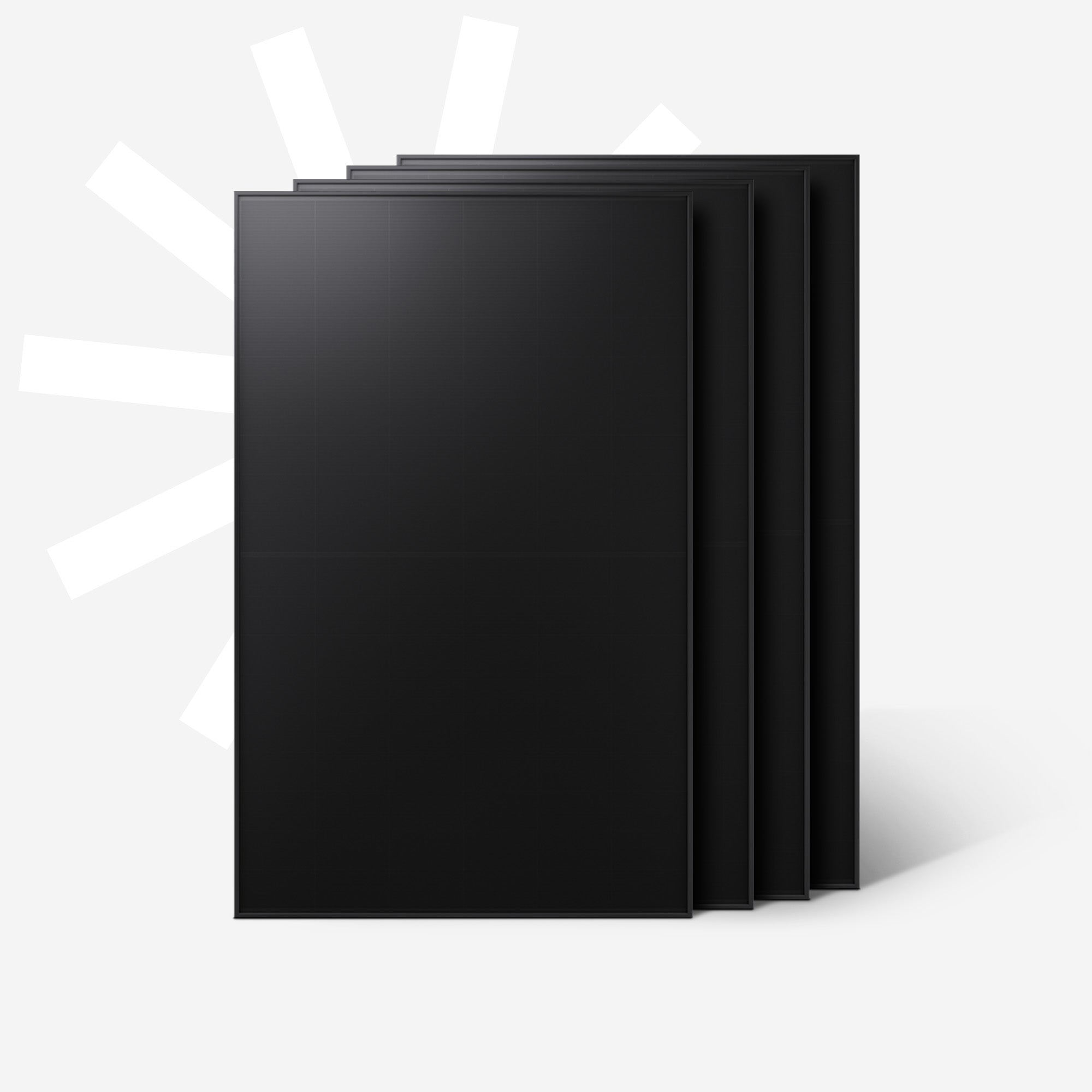 Drei schwarze Solarmodule nebeneinander auf hellem Hintergrund.