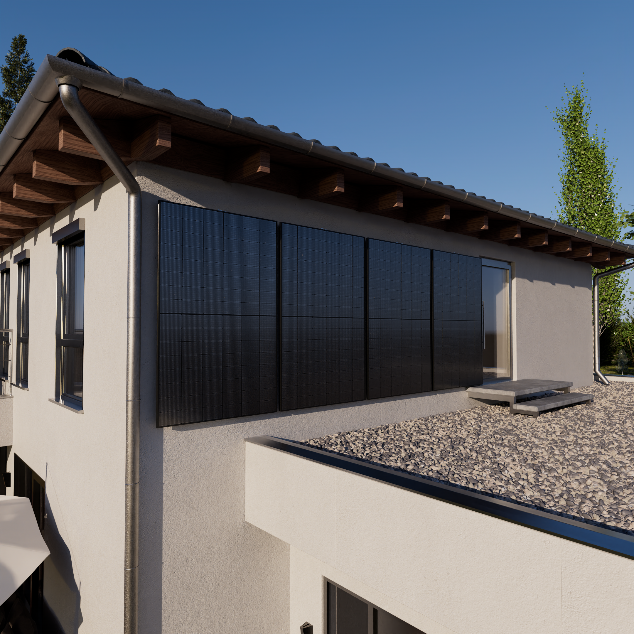 Ein Haus mit schwarzen Solarzellen an der Wand und Kieselsteinen auf dem Dach.