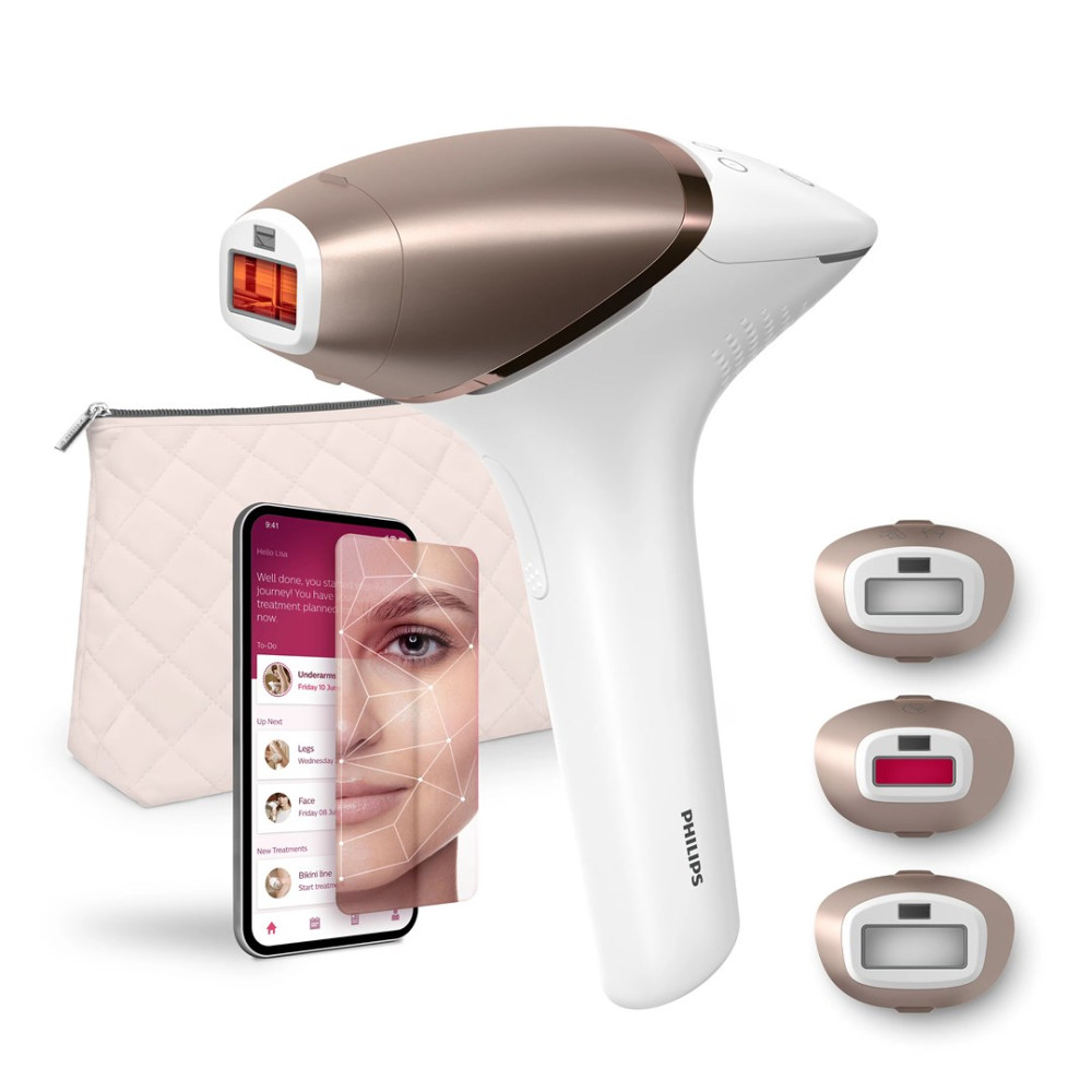 Un dispositivo IPL per la depilazione con accessori e app su telefono, davanti a una pochette.