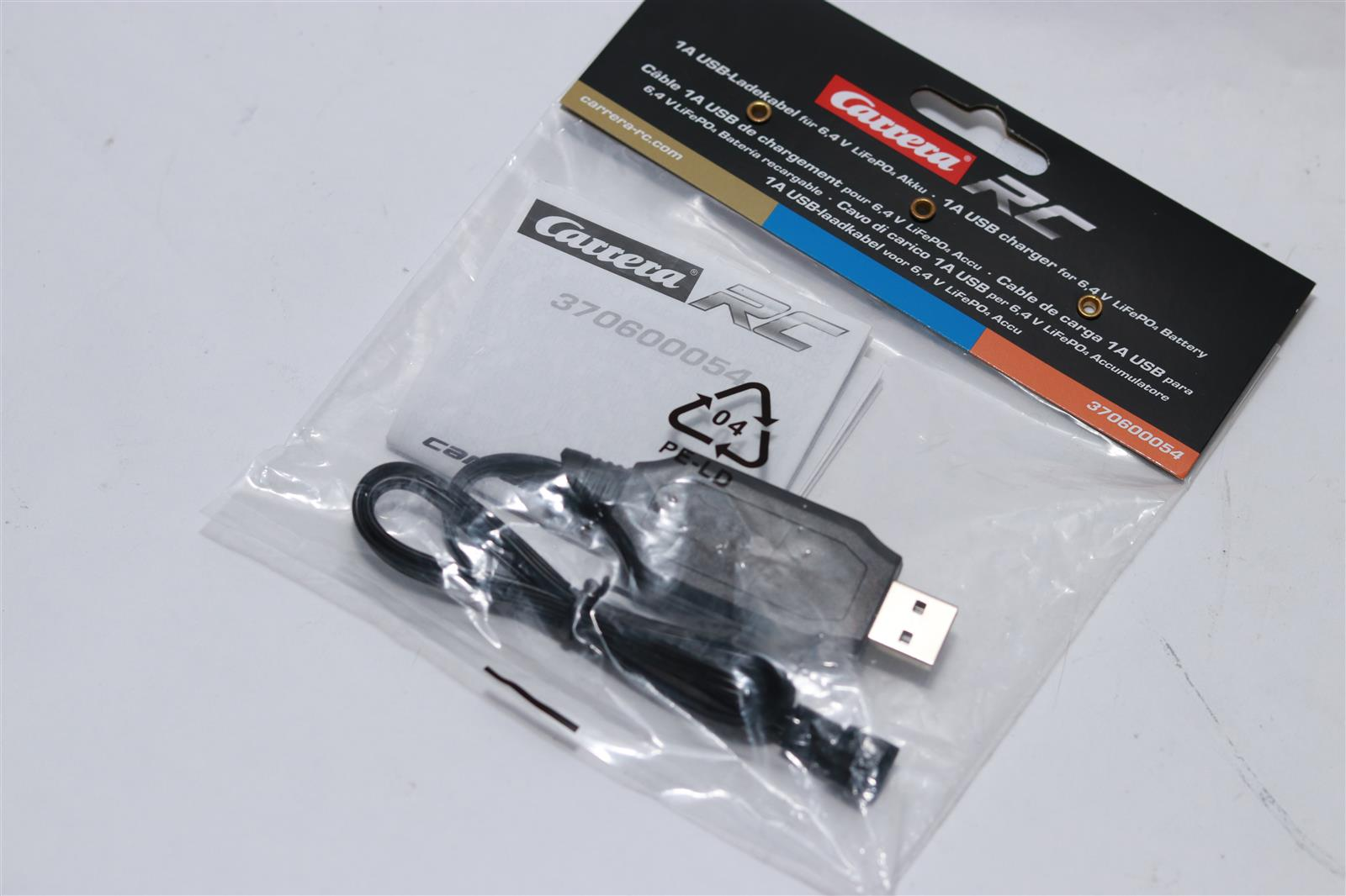 Carrera RC 1A USB Ladegerät für 6,4V LiFePO4 Akku in Verpackung.