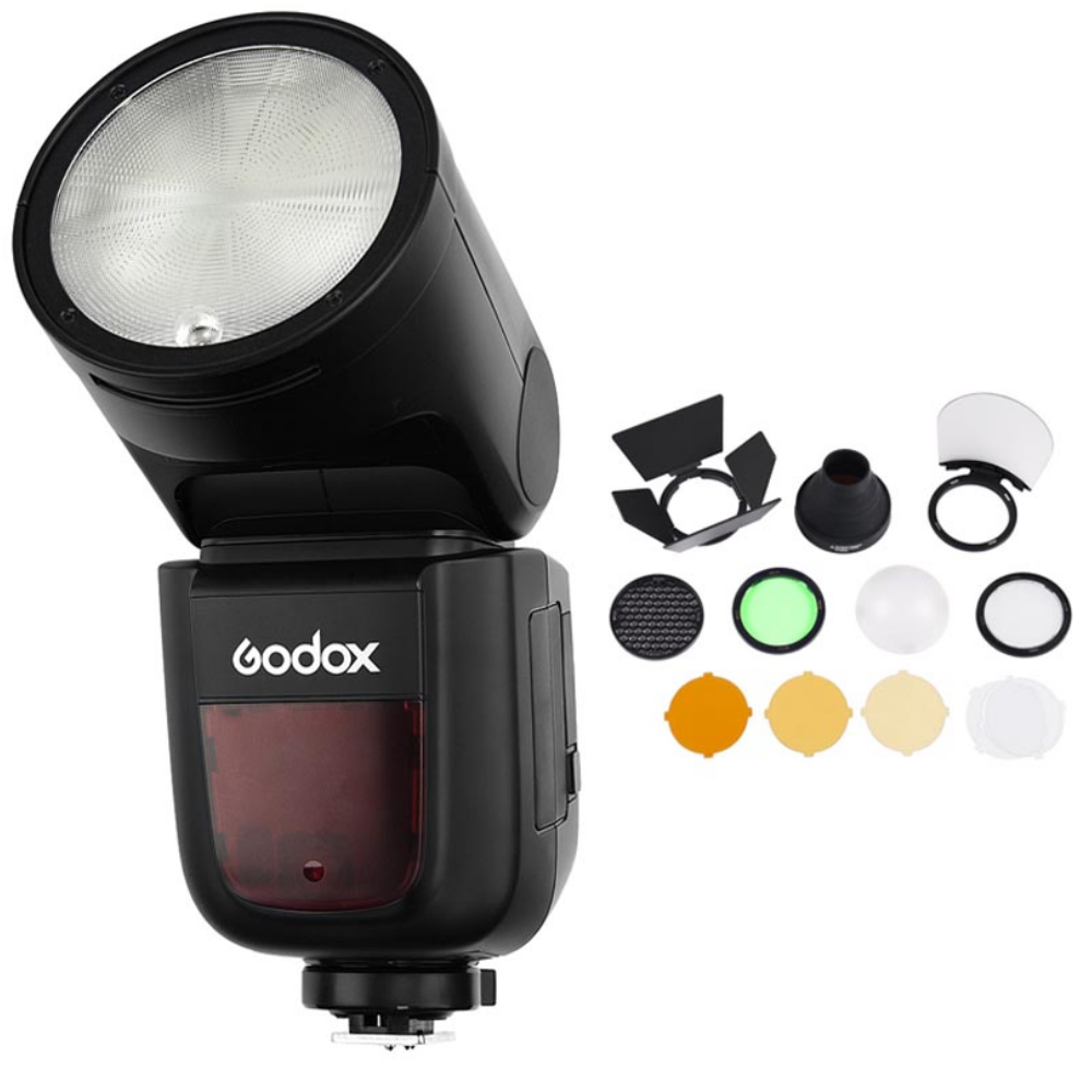 Een zwarte Godox flitser met accessoires, roosters en kleurengels.