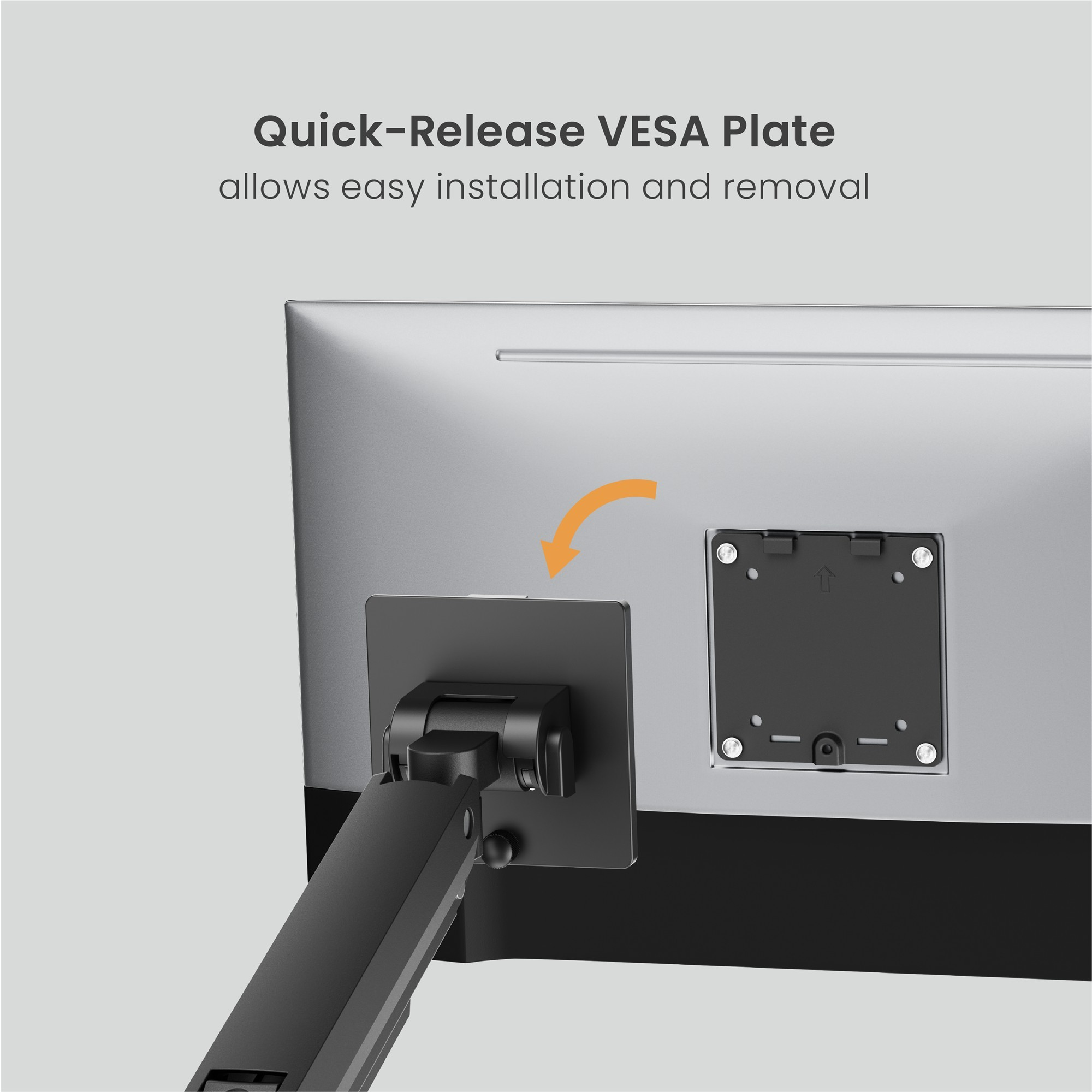 Ein Monitorarm wird an der Rückseite eines Monitors mit einer VESA-Platte befestigt.