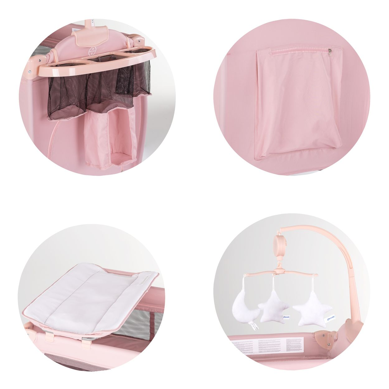 Rosa Kinderbett-Zubehör: Aufbewahrung, Tasche, Wickelauflage und Mobile mit Sternen.