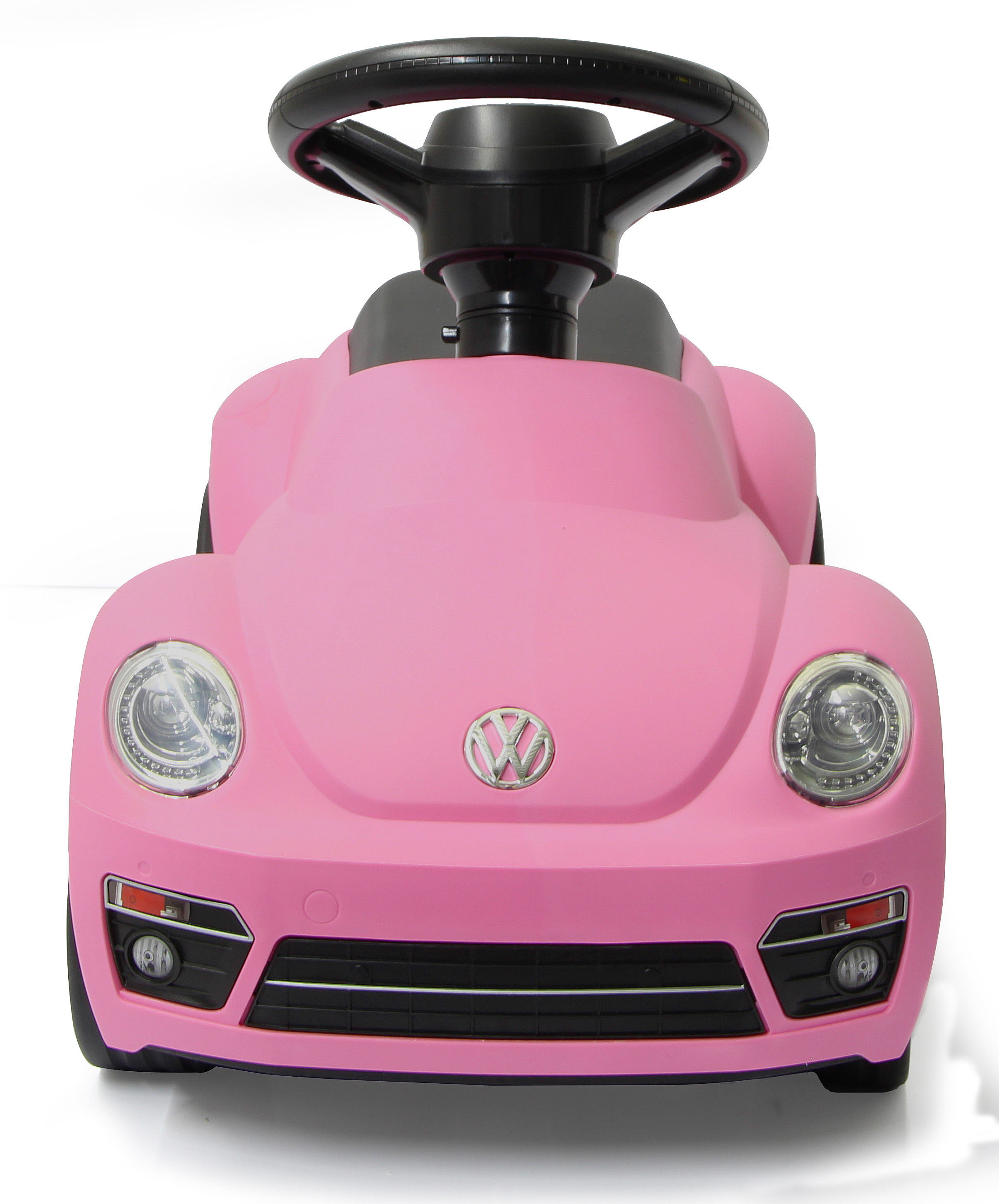 Ein rosafarbener Spielzeug-VW mit schwarzem Lenkrad und VW-Logo.