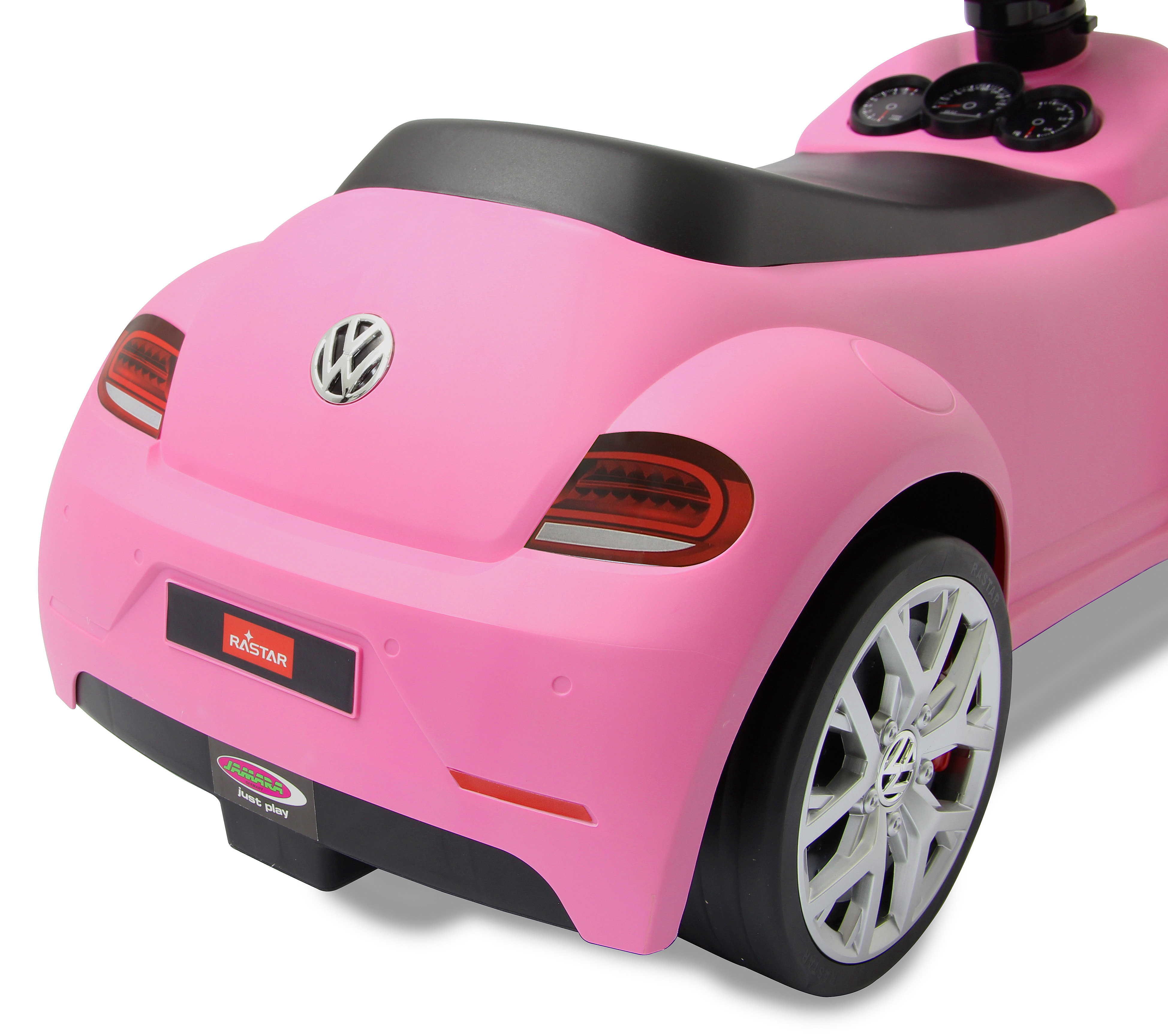 Ein rosa Spielzeugauto im Stil eines VW Käfers mit detaillierten Rückleuchten.