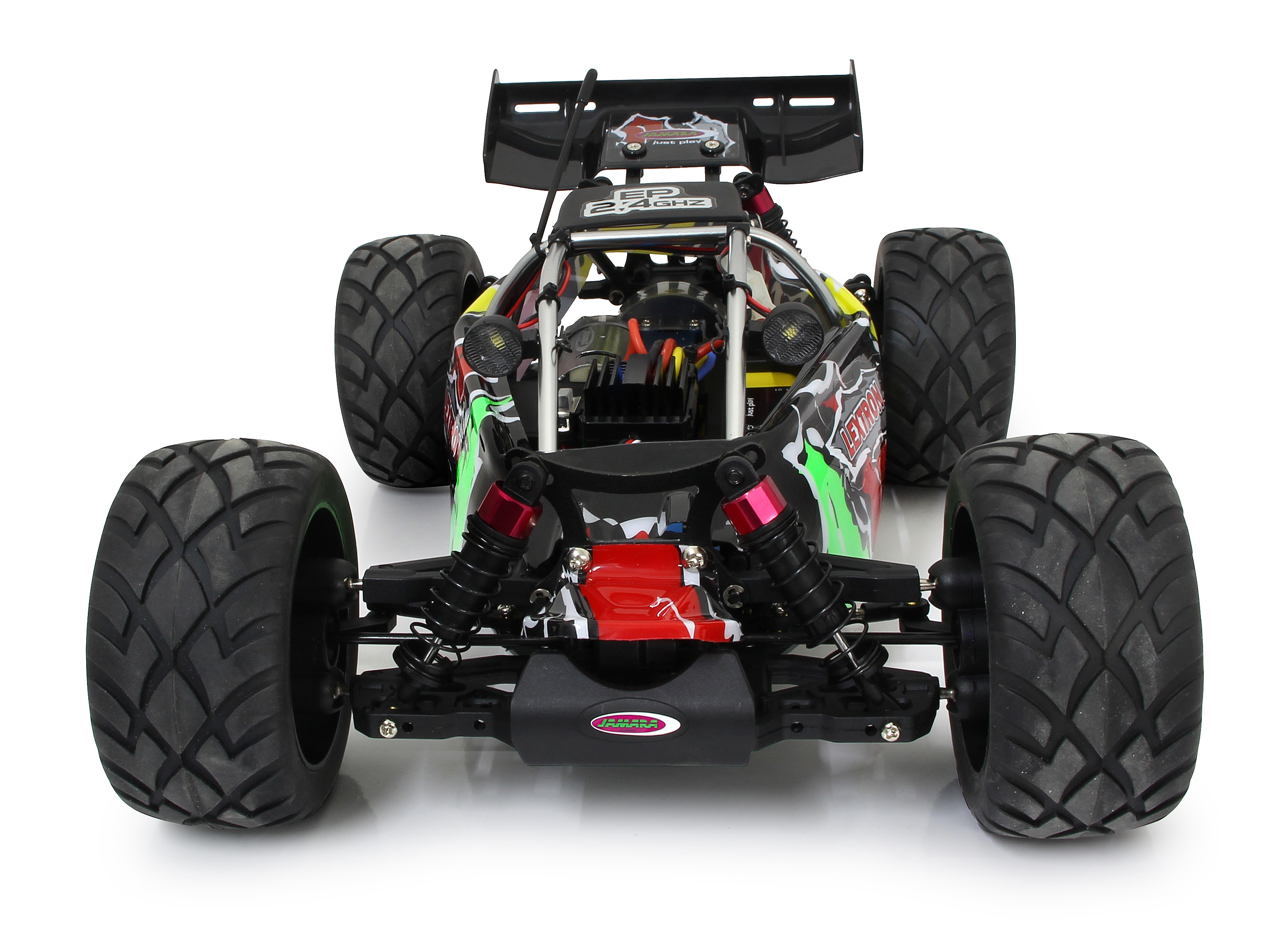 Ein ferngesteuerter Buggy mit schwarzen Reifen, rotem und grünem Dekor.